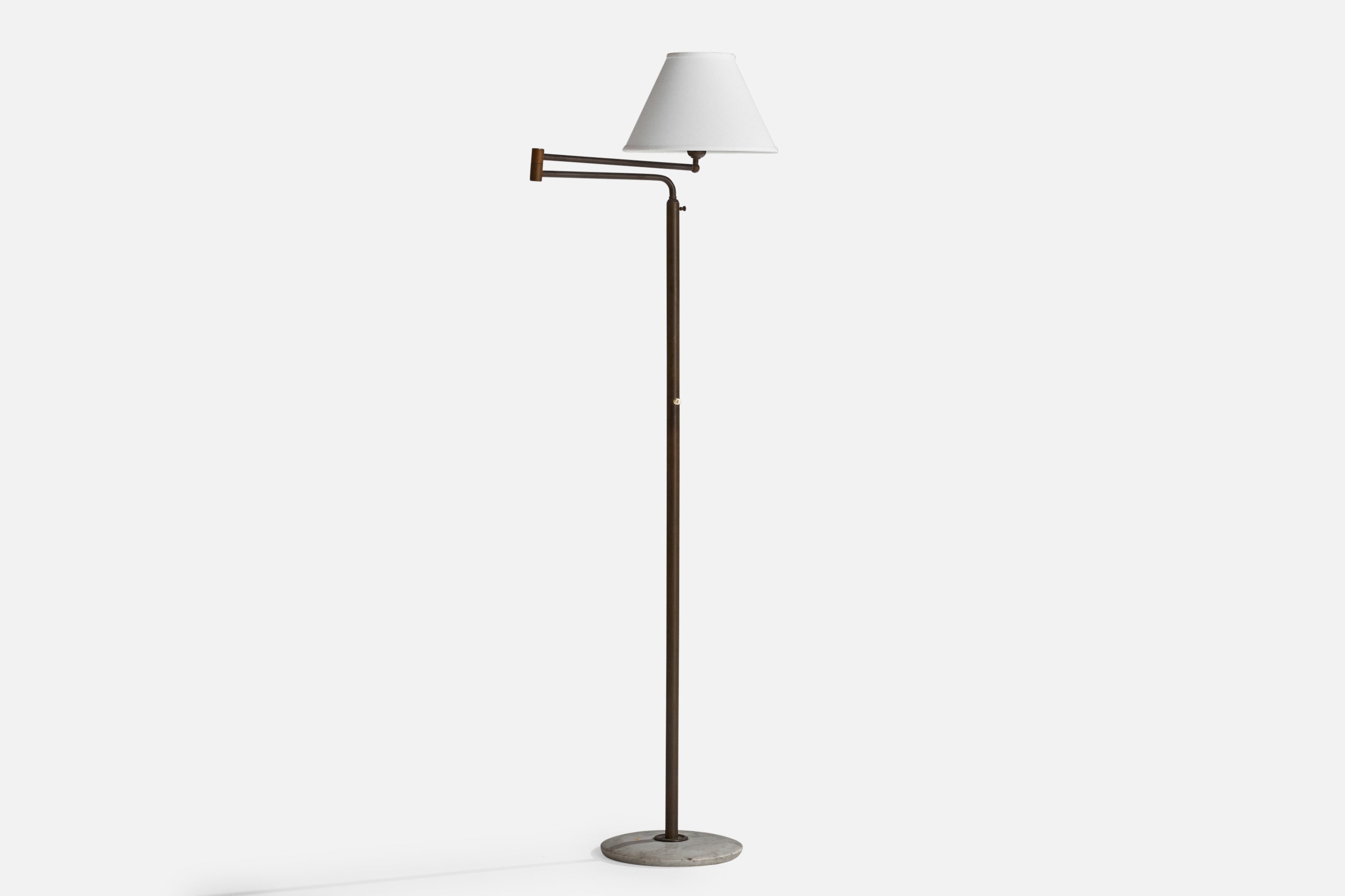 An adjustable brass, marble and white fabric floor lamp designed and produced in Italy, c. 1950s.

Overall Dimensions (inches): 64” H x 20”  W x 12.5” D
Stated dimensions include shade.
Bulb Specifications: E-26 Bulb
Number of Sockets: 1
All