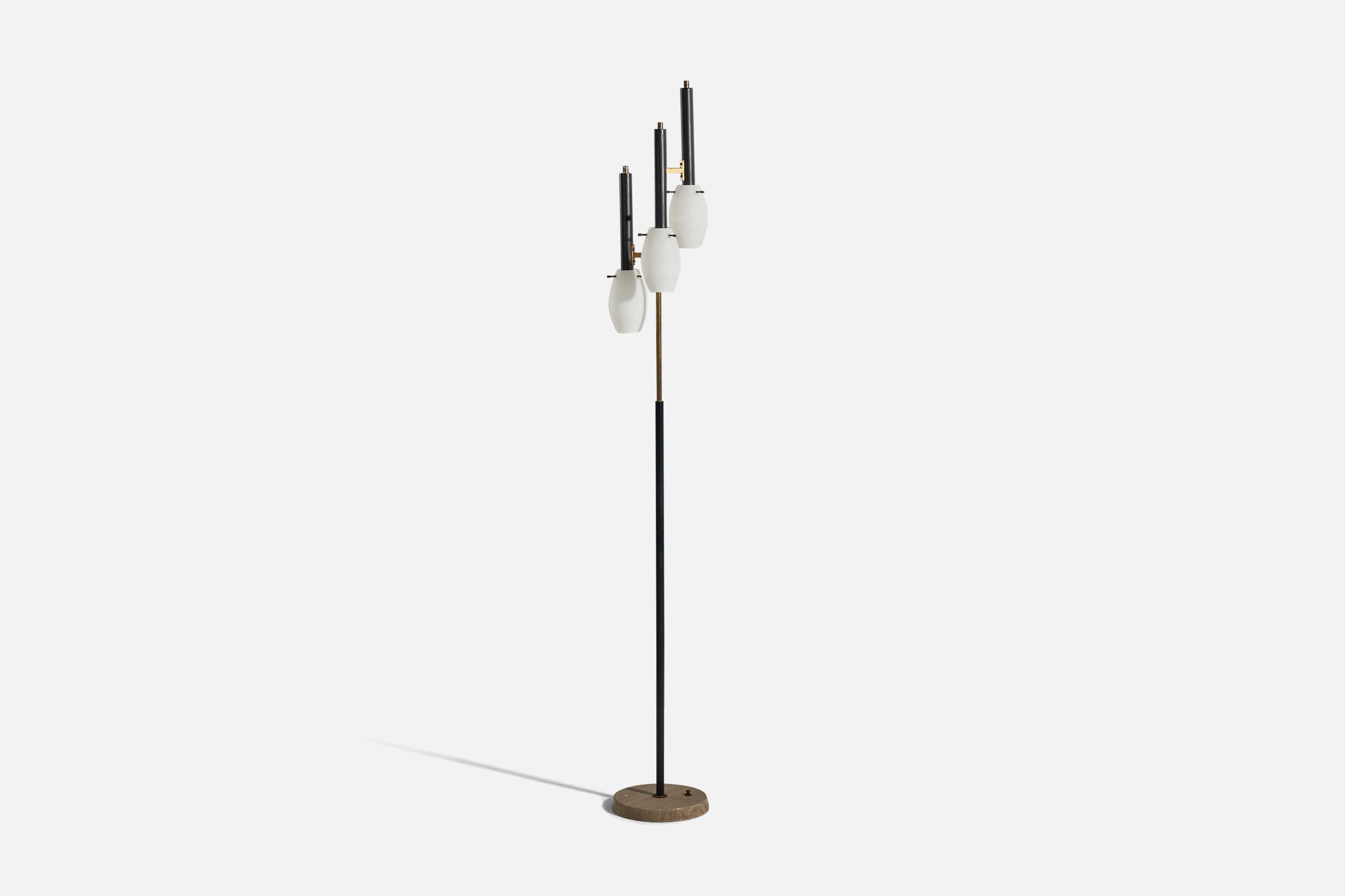 A brass, metal, glass and marble floor lamp designed and produced in Italy, c. 1960s.

 