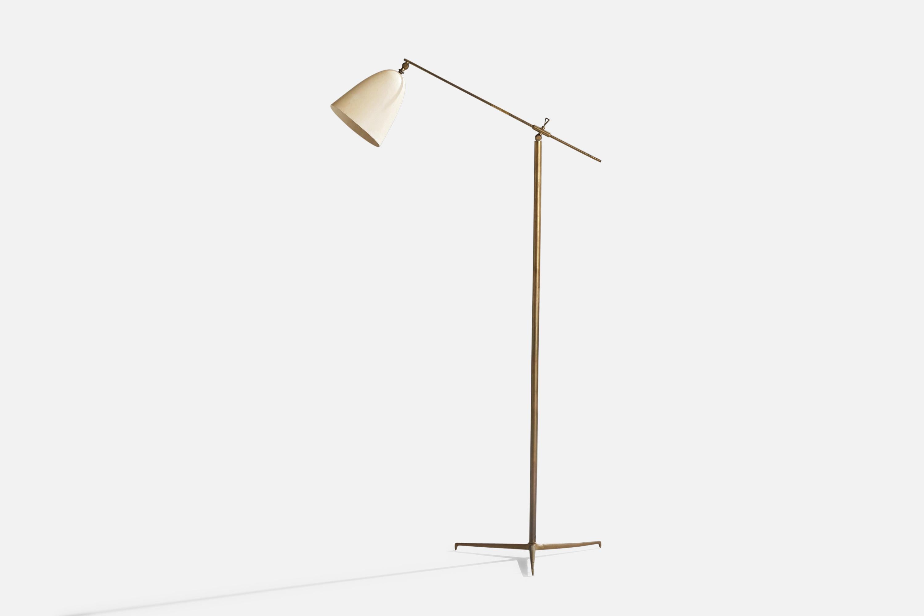 An adjustable brass and cream-lacquered metal floor lamp designed and produced in Italy, 1950s.

Overall Dimensions (inches): 68” H x 20” W” 35” D
Dimensions are variable
Stated dimensions include shade.
Bulb Specifications: E-26 Bulb
Number of