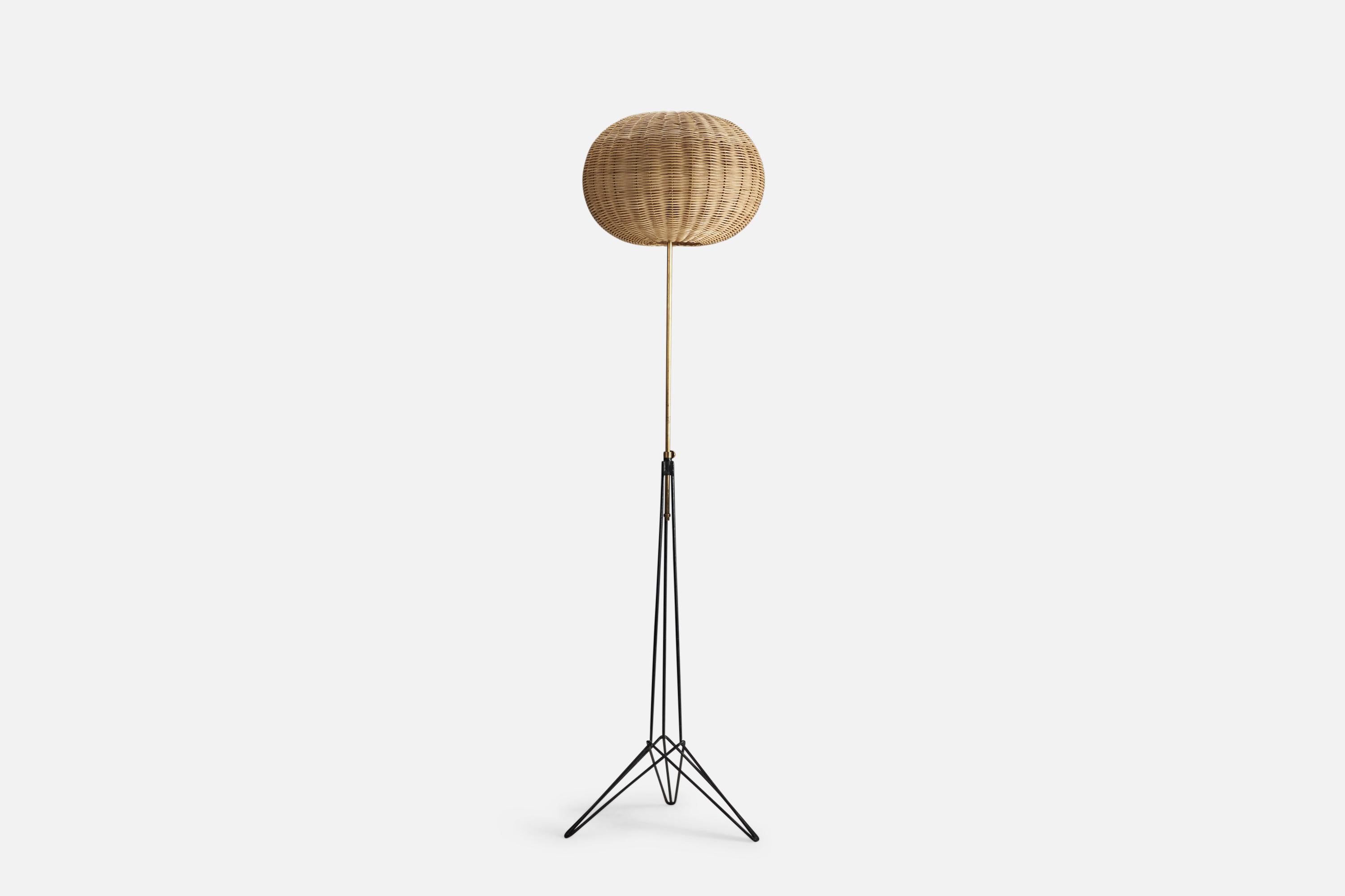 A brass, metal and rattan floor lamp designed and produce by an Italian Designer, Italy, 1960s.

Socket takes standard E-26 medium base bulb.

There is no maximum wattage stated on the fixture.