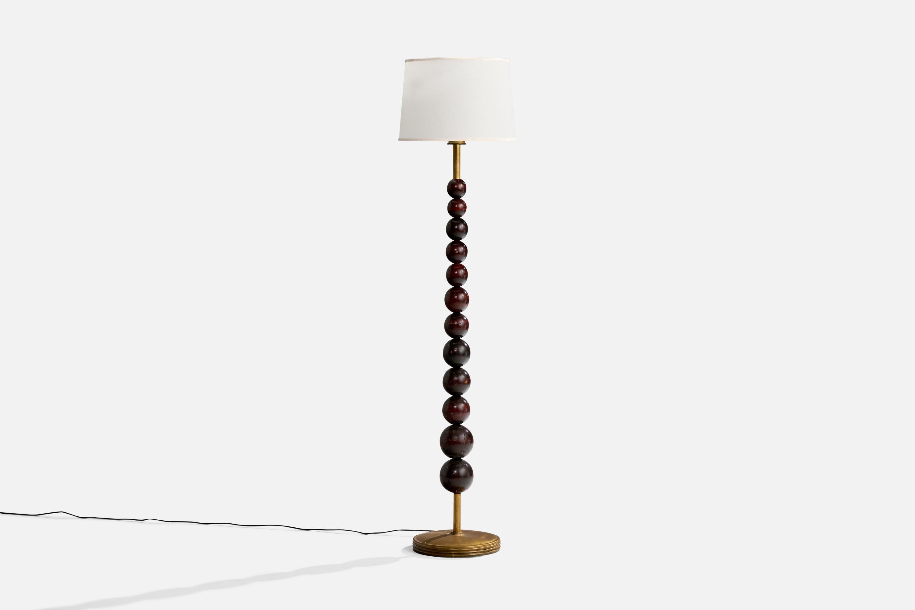 A brass, dark-stained wood and white parchment paper floor lamp designed and produced in Italy, c. 1930s.

Overall Dimensions (inches): 67