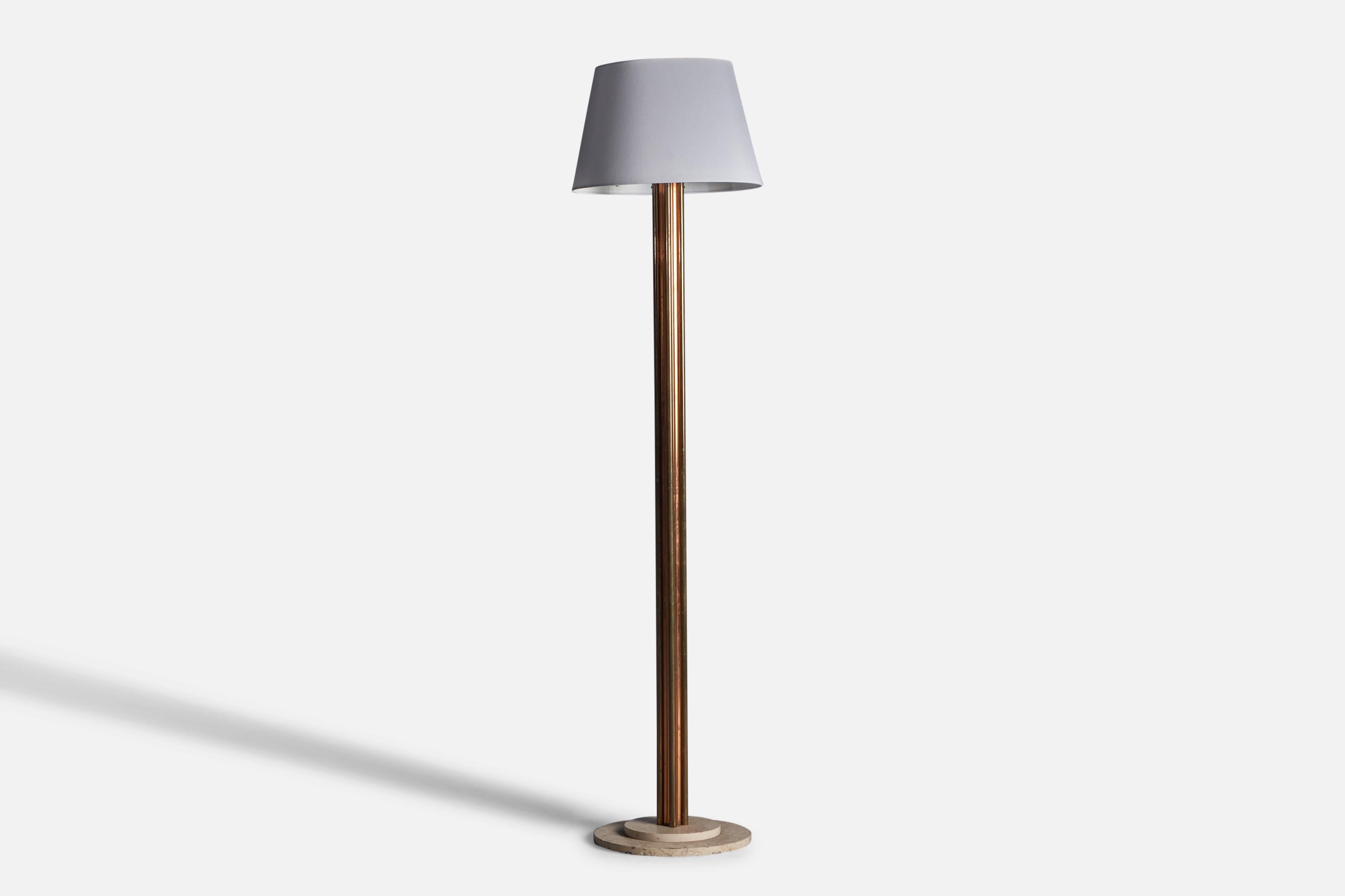 A sizeable brass, copper and travertine floor lamp, designed and produced in Italy, c. 1940s.

Overall Dimensions: 74.5
