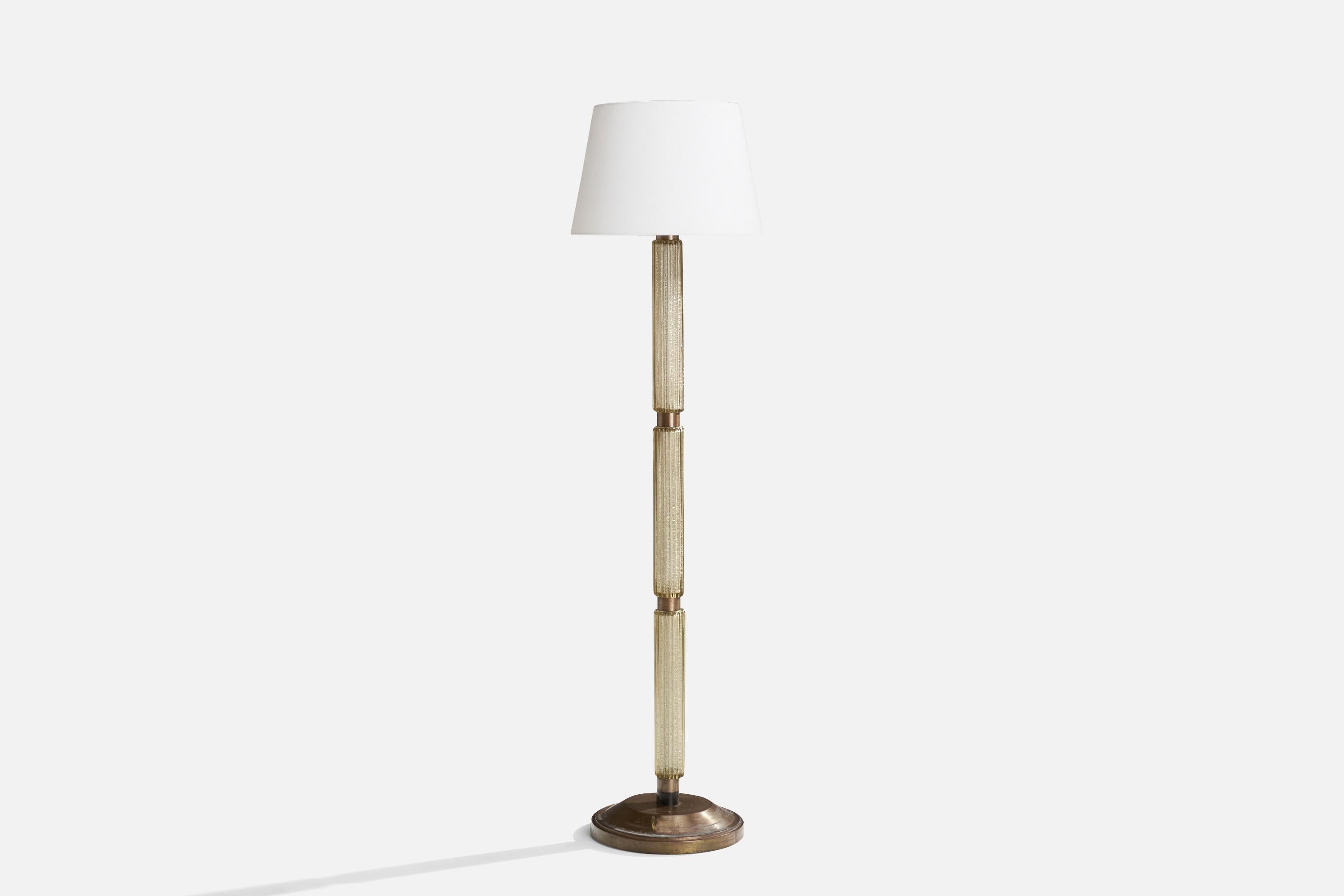 A brass and glass floor lamp designed and produced in Italy, c. 1930s.

Overall Dimensions (inches): 62” H x 16” W x 16.5” D
Stated dimensions include shade.
Bulb Specifications: E-26 Bulb
Number of Sockets: 1
All lighting will be converted for US