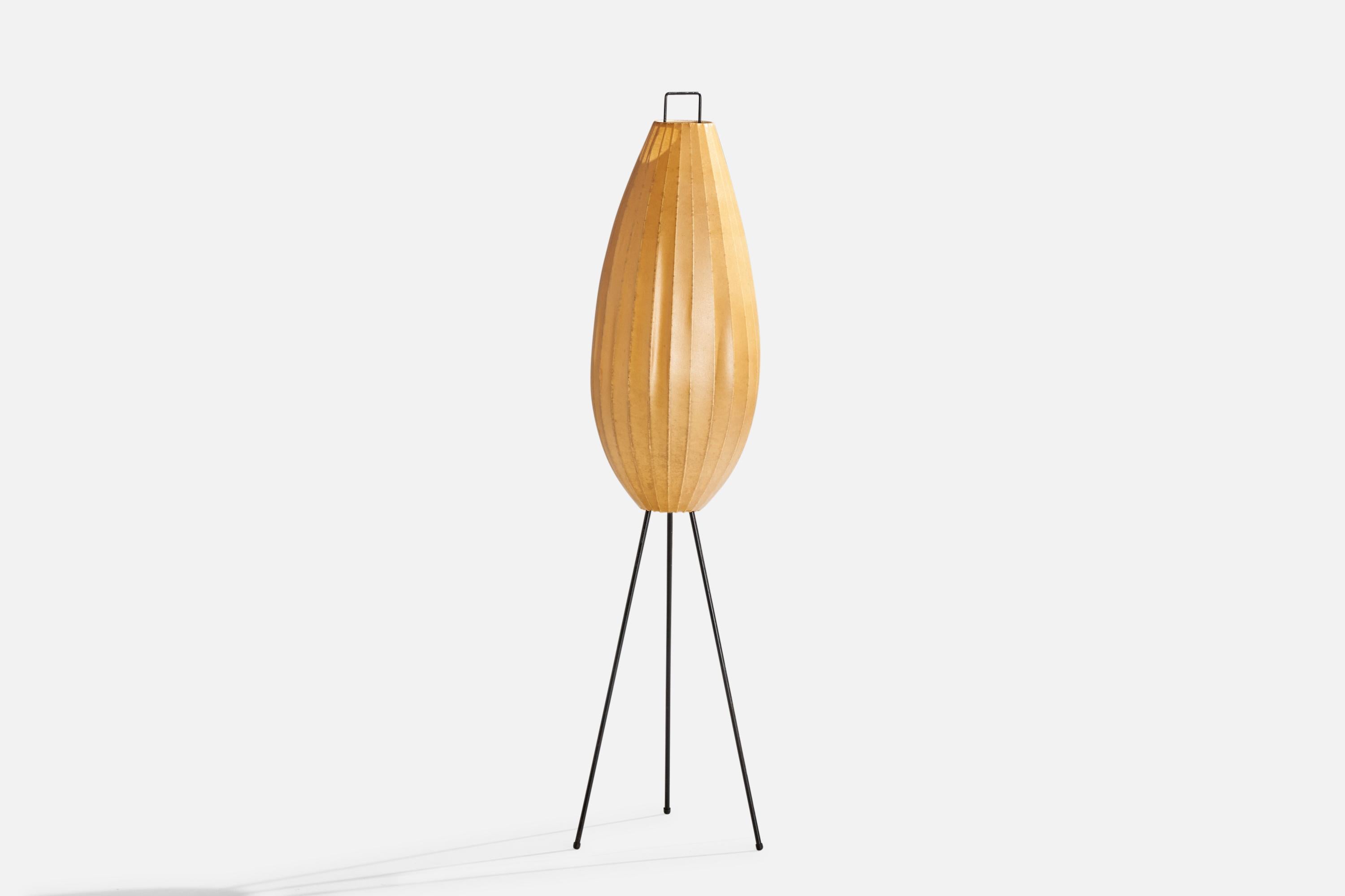 A black-lacquered metal and beige resin floor lamp designed and produced in Italy, c. 1960s.

Overall Dimensions (inches): 50.75” H x 7.25” D
Stated dimensions include shade.
Bulb Specifications: E-26 Bulb
Number of Sockets: 1
All lighting will be