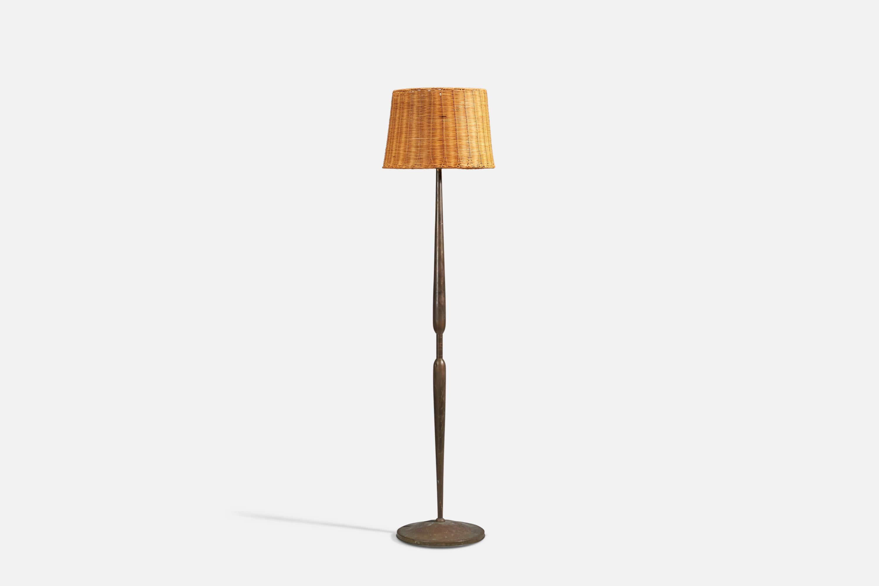 A brass, rattan, fabric floor lamp designed and produced in Italy, 1940s.

Dimensions stated are of Floor Lamp with Lampshade. 

Socket takes standard E-26 medium base bulb.

There is no maximum wattage stated on the fixture.