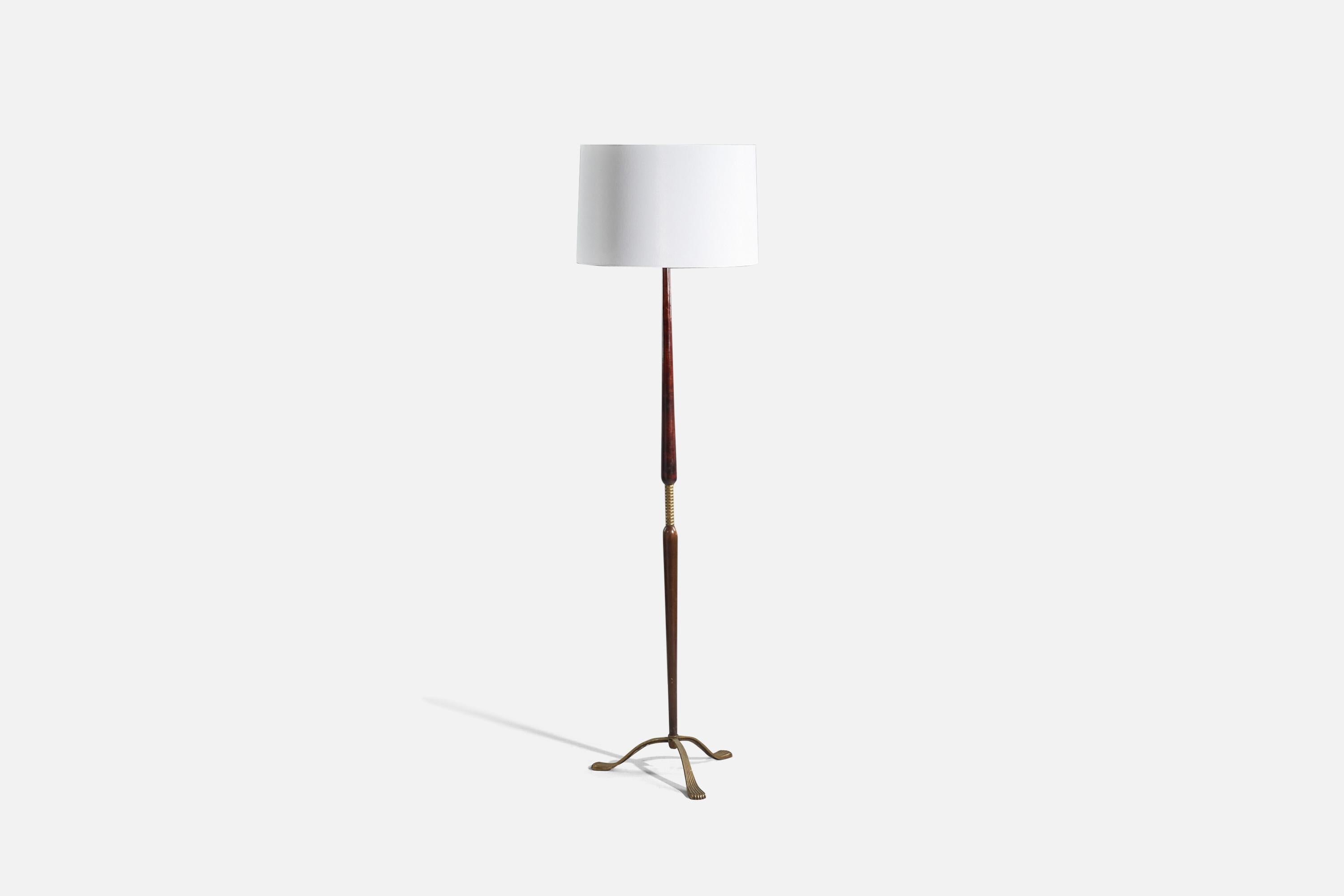 A brass, walnut and fabric floor lamp designed and produced in Italy, 1940s.

Sold with Lampshade(s). 
Stated dimensions refer to the Floor Lamp with the Shade(s). 

Socket takes standard E-26 medium base bulb.
There is no maximum wattage