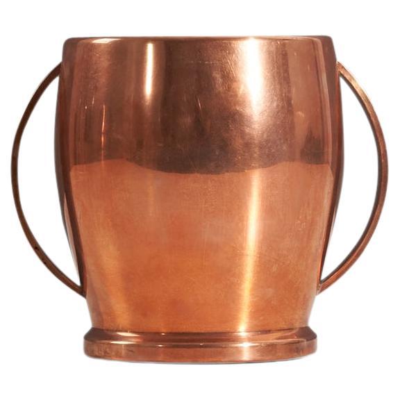 A copper ice bucket produced in Italy, 1930s-1940s.