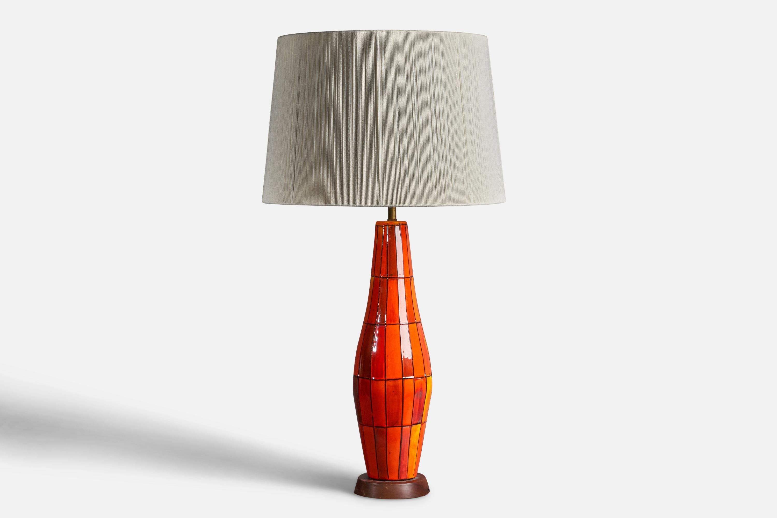 A large red-lacquered and hand-painted ceramic, walnut and string fabric table lamp, designed and produced in Italy, c. 1960s.

Overall Dimensions (inches): 40” H x 21.25” Diameter
Bulb Specifications: E-26 Bulb
Number of Sockets: 1