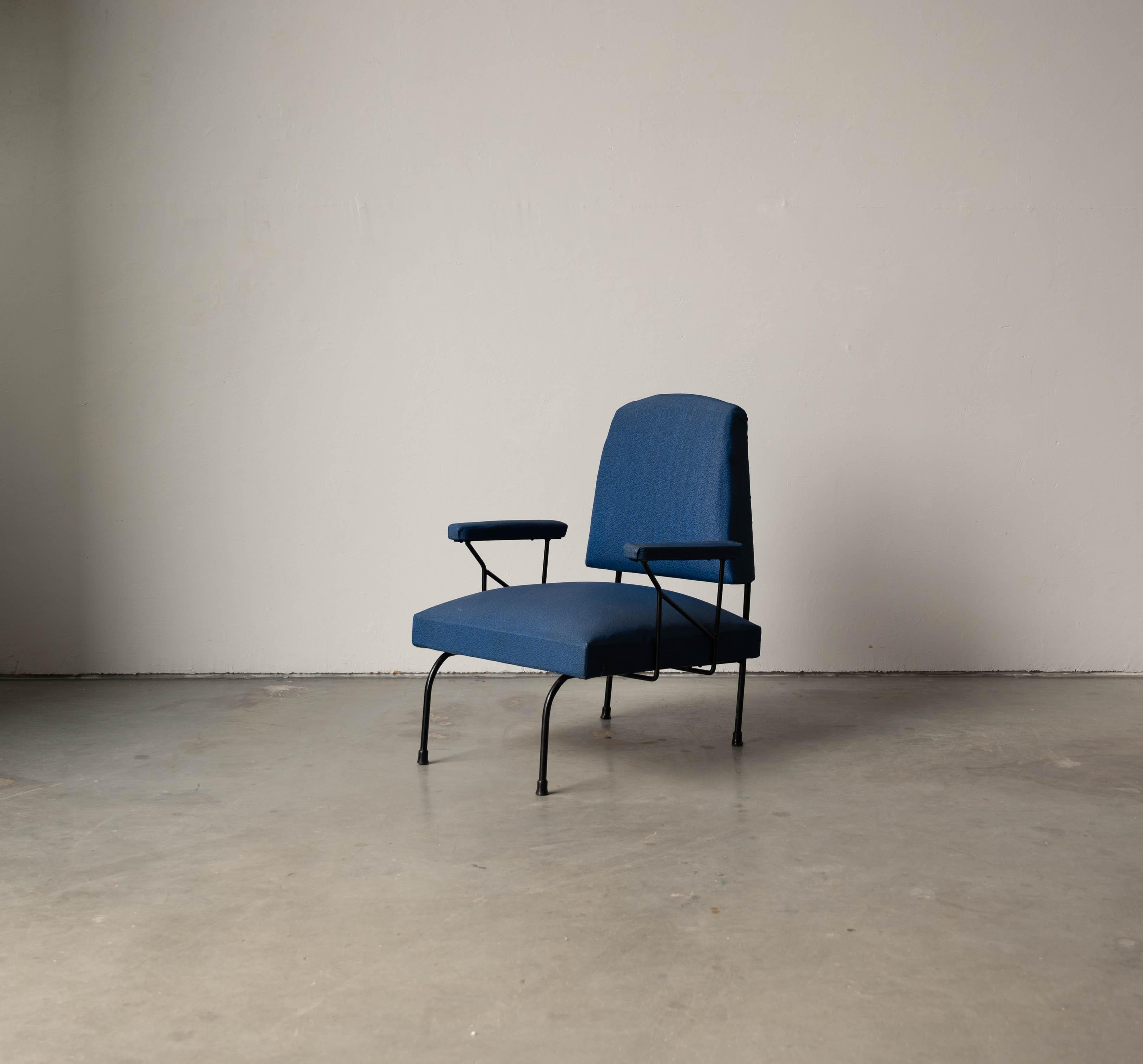 A black-lacquered metal and blue fabric lounge chair designed and produced in Italy, 1940s. 



