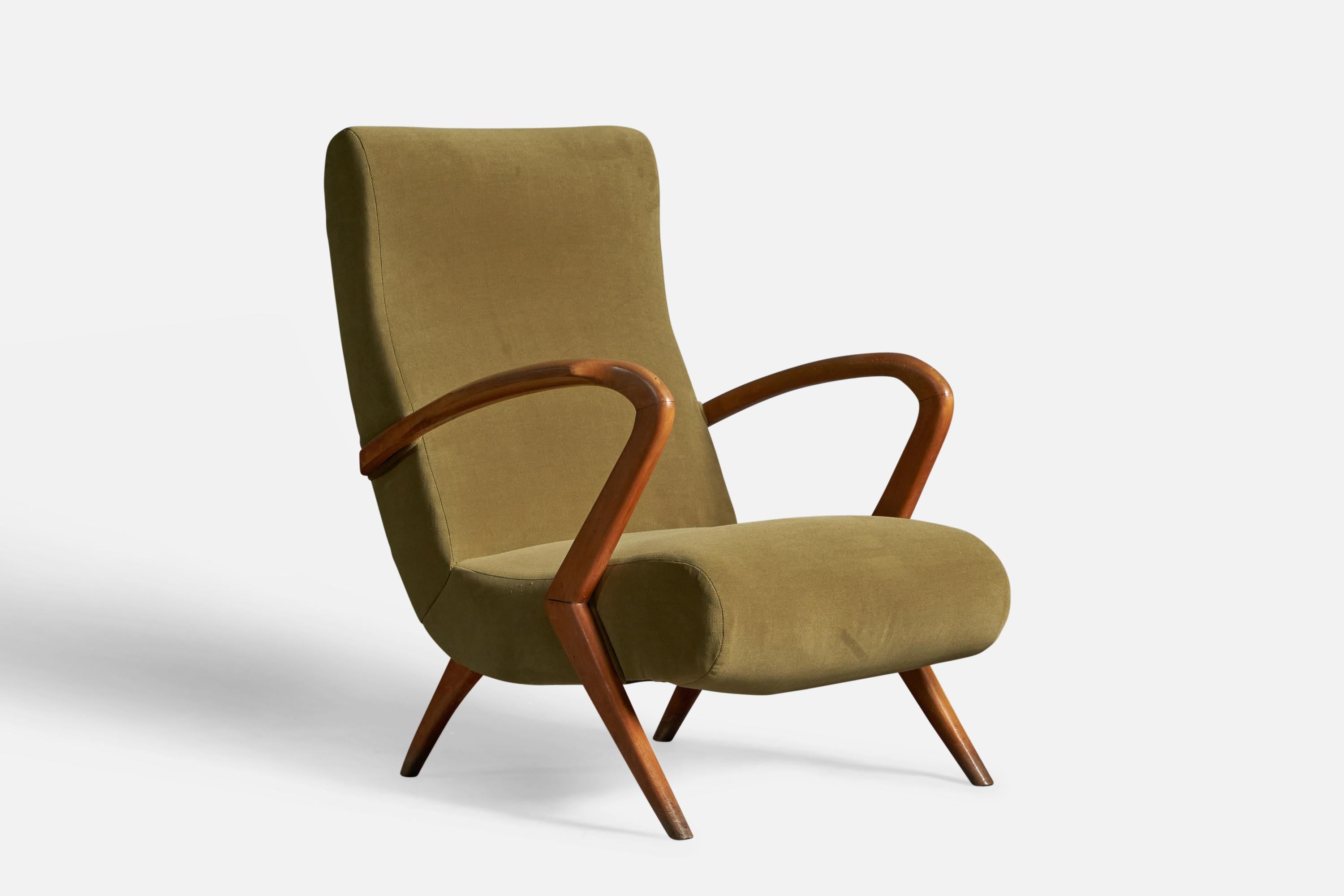 A walnut and green velvet lounge chair, designed and produced in Italy, c. 1950s.
