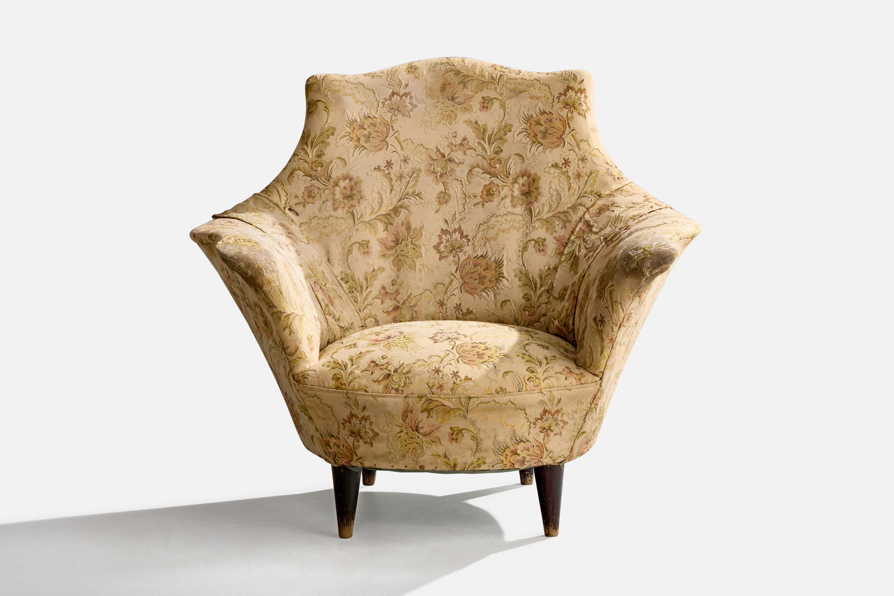 A wood and floral-printed fabric lounge chair designed and produced in Italy, c. 1940s.

Overall Dimensions (inches): 32.375