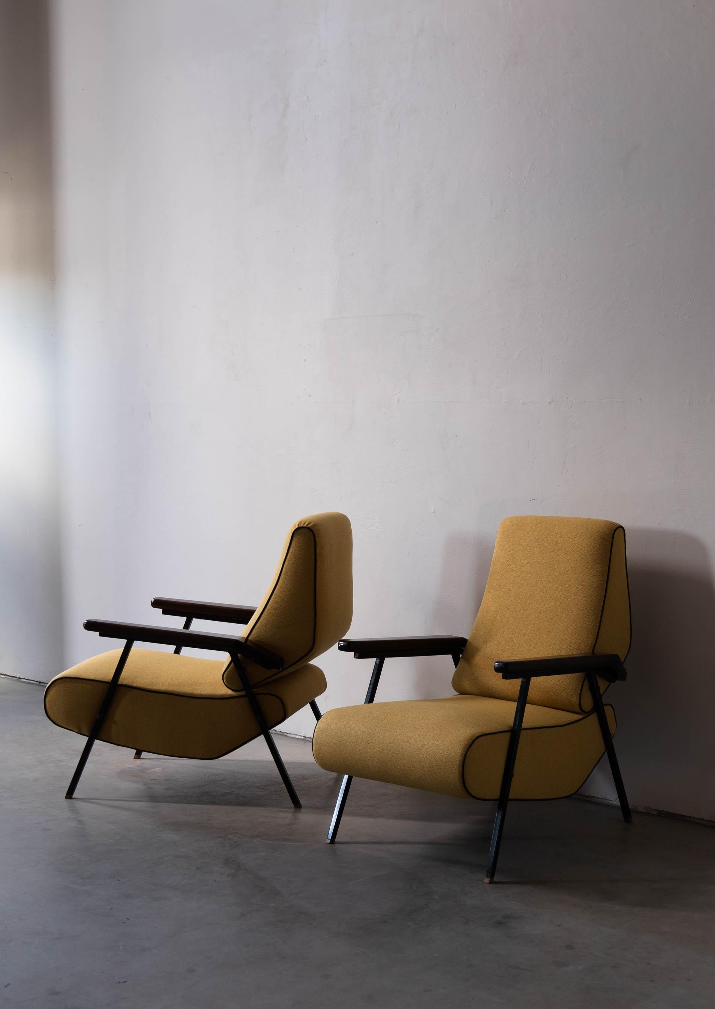 A pair of black-lacquered metal, wood and fabric lounge chair designed and produced in Italy, 1940s. 



