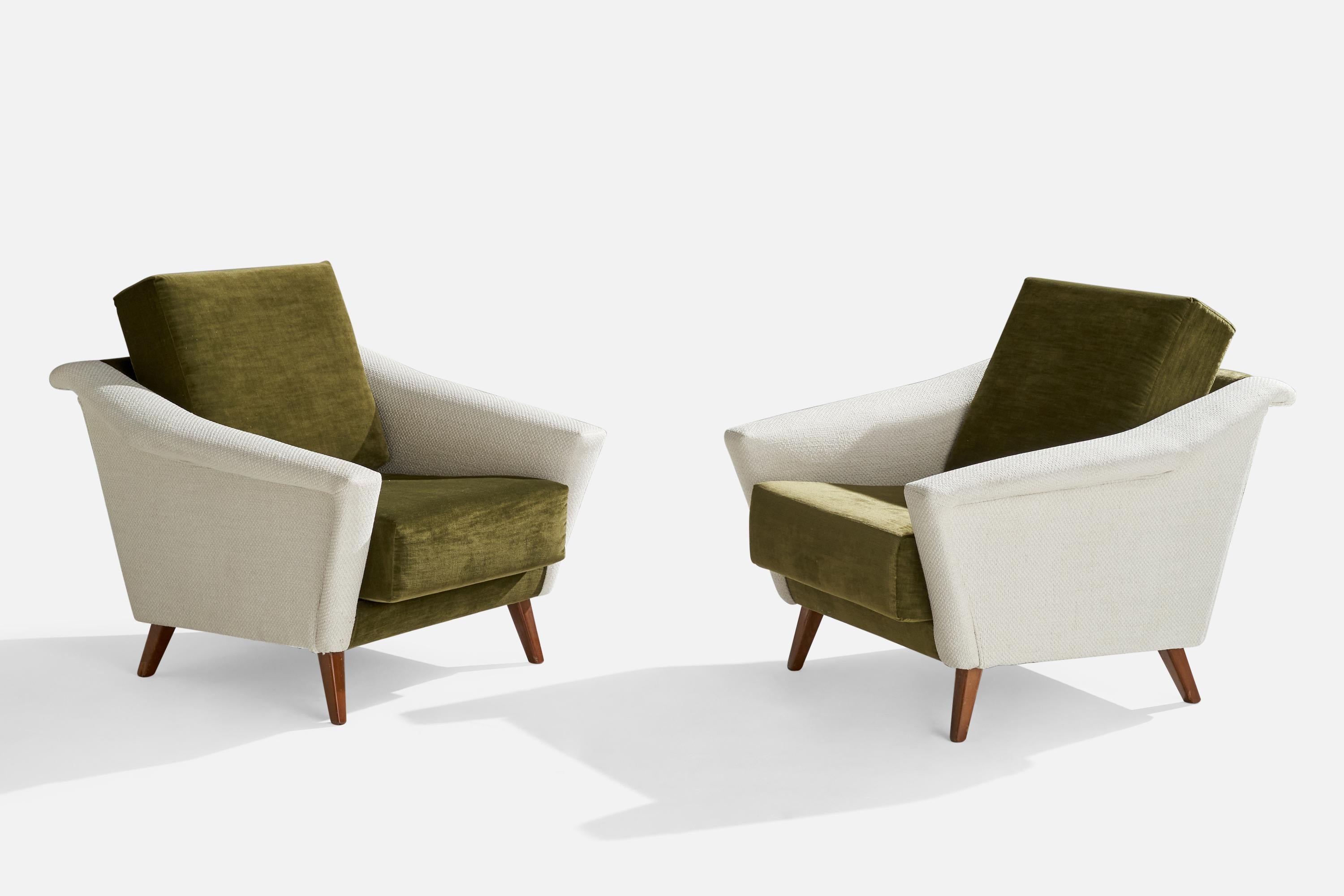 A pair of white fabric, green velvet and walnut lounge chairs designed and produced in Italy, 1950s.

Seat height 16”.