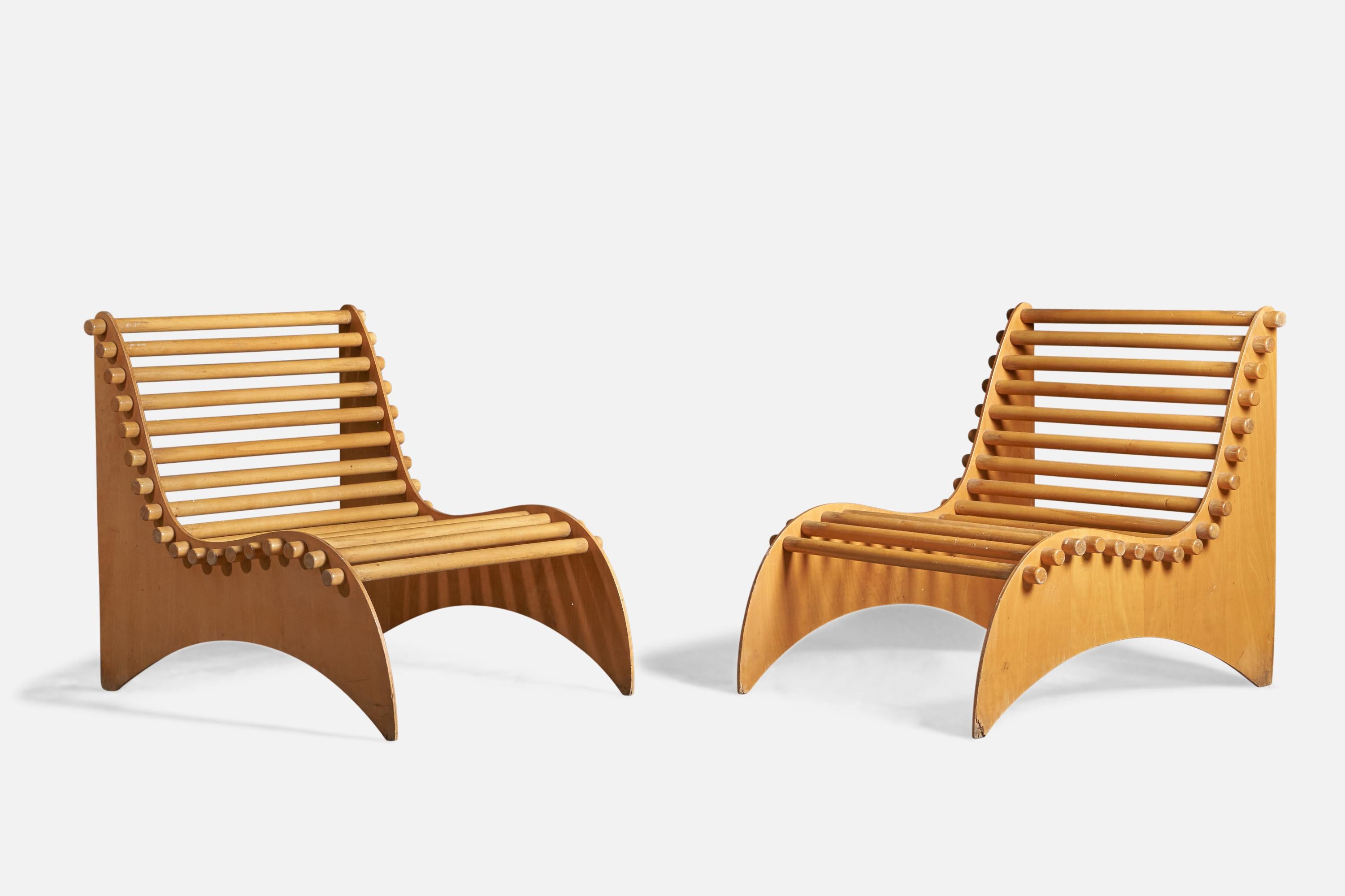 A pair of plywood and solid wood lounge chairs or slipper chairs, designed and produced in Italy, c. 1960s

14.75