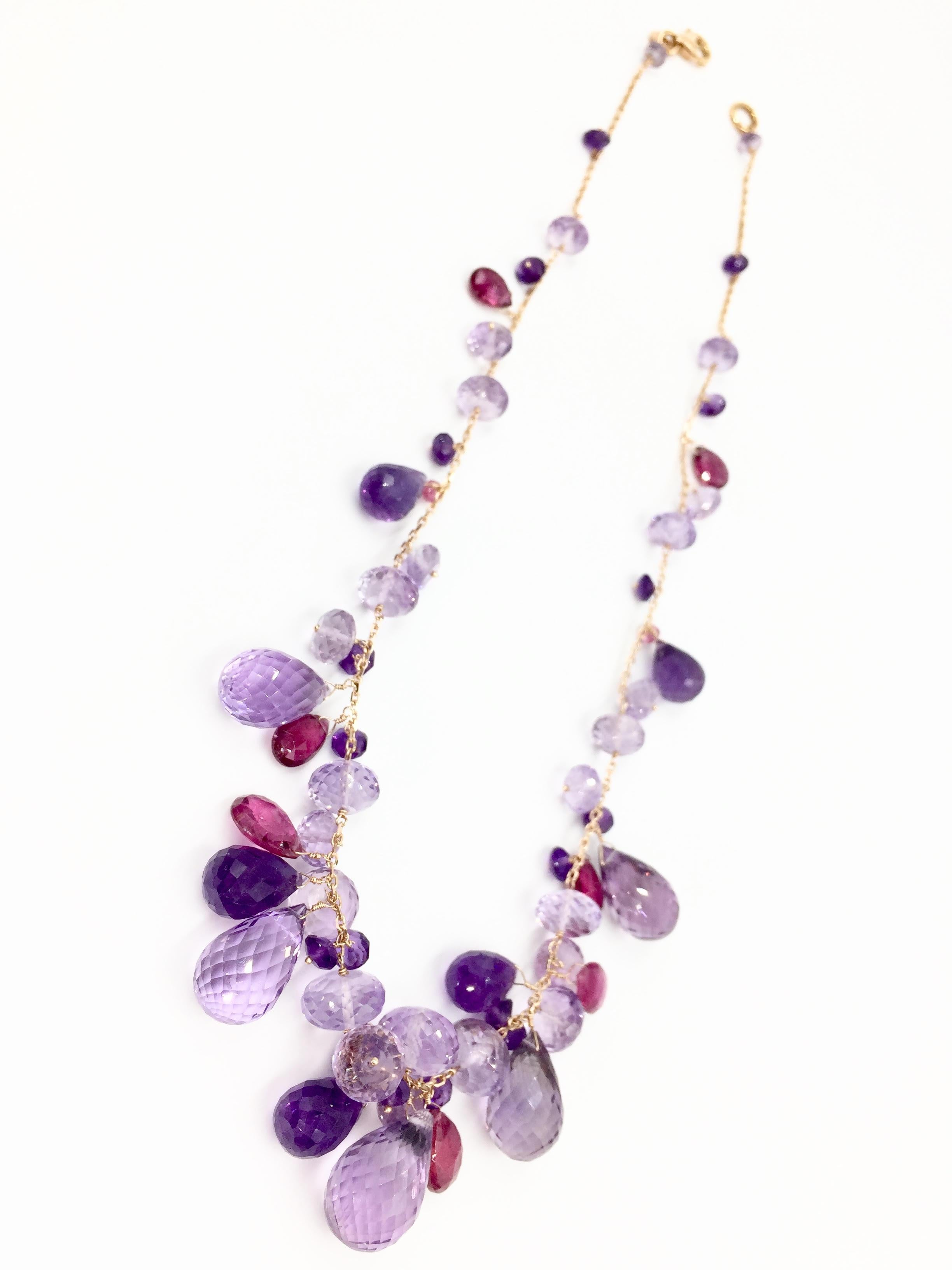 Beautifully faceted amethyst and pink tourmalines are expertly stationed on an 18 karat rose gold necklace. Created by high-end Italian jewelry designer, Mariani. Shades of amethyst vary from rich plum to pale lavender. Total weight of amethyst is