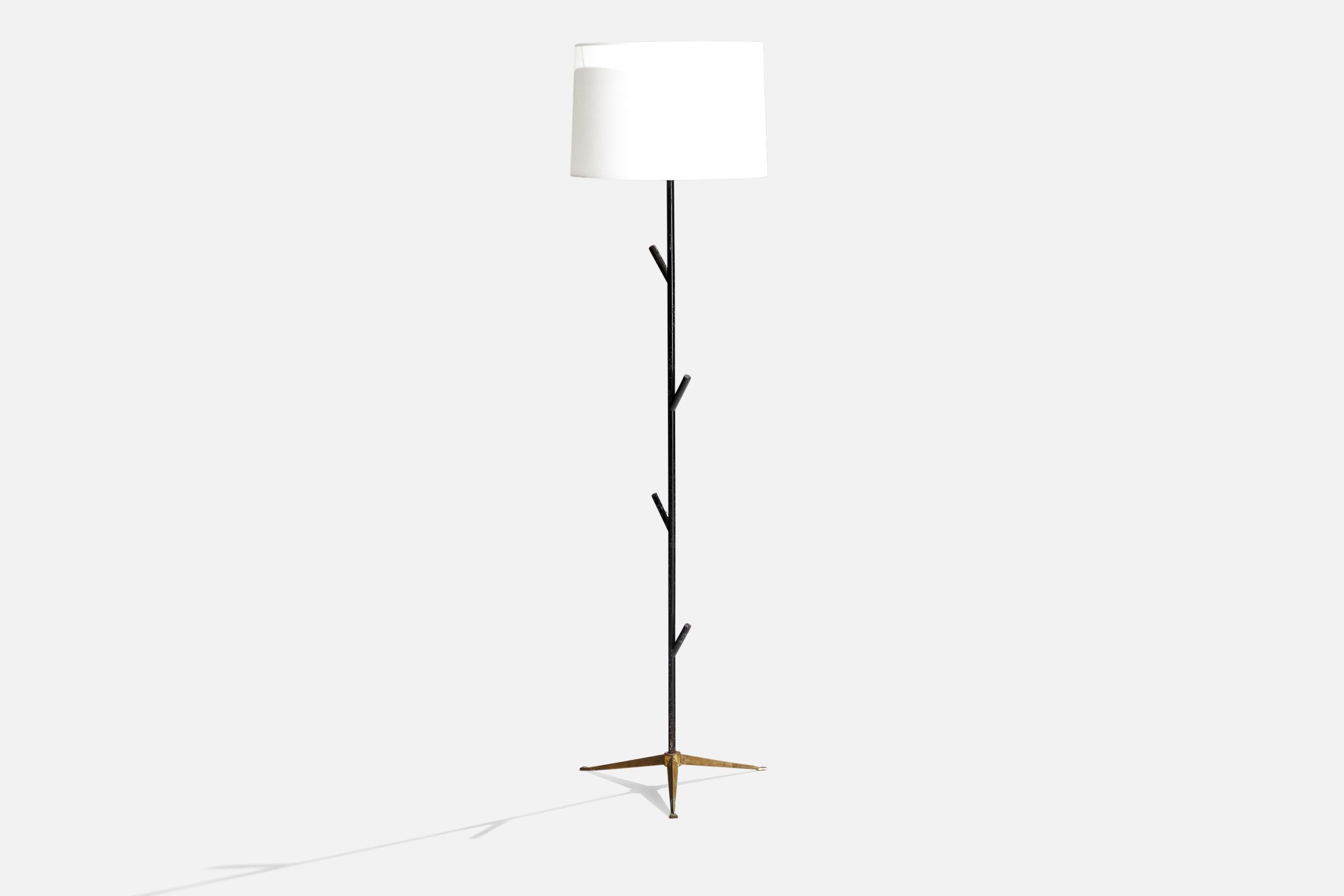 A black-lacquered metal, brass and fabric floor lamp designed and produced in Italy, c. 1950s.

Overall Dimensions (inches): 70” H x 18” D
Stated dimensions include shade.
Bulb Specifications: E-26 Bulb
Number of Sockets: 3
All lighting will be