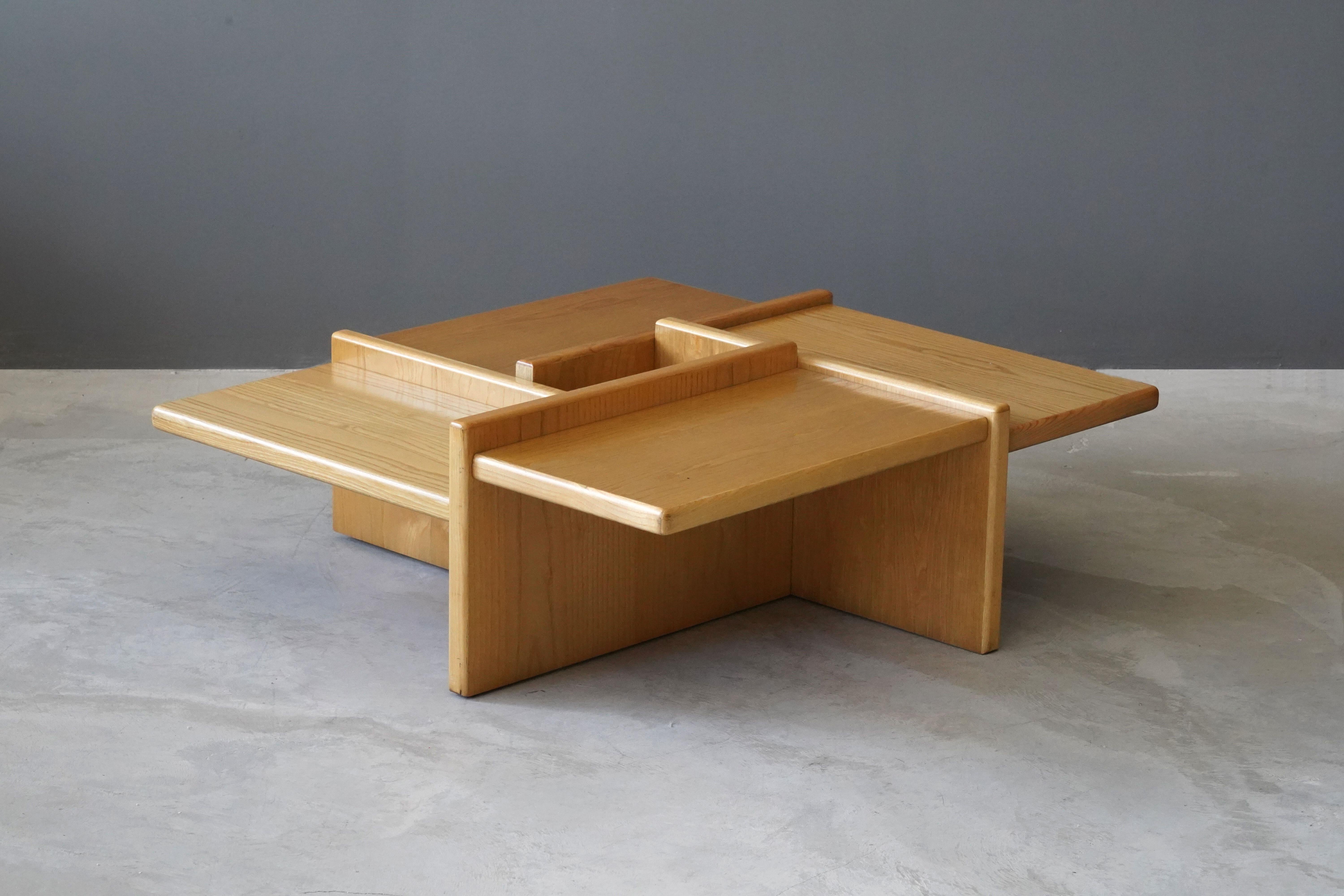 A minimalist coffee / cocktail table. Designed and produced in Italy, 1970s. In solid oak.

Other designers of the period include Franco Albini, Mario Bellini, Donald Judd, Scott Burton, Charlotte Perriand..