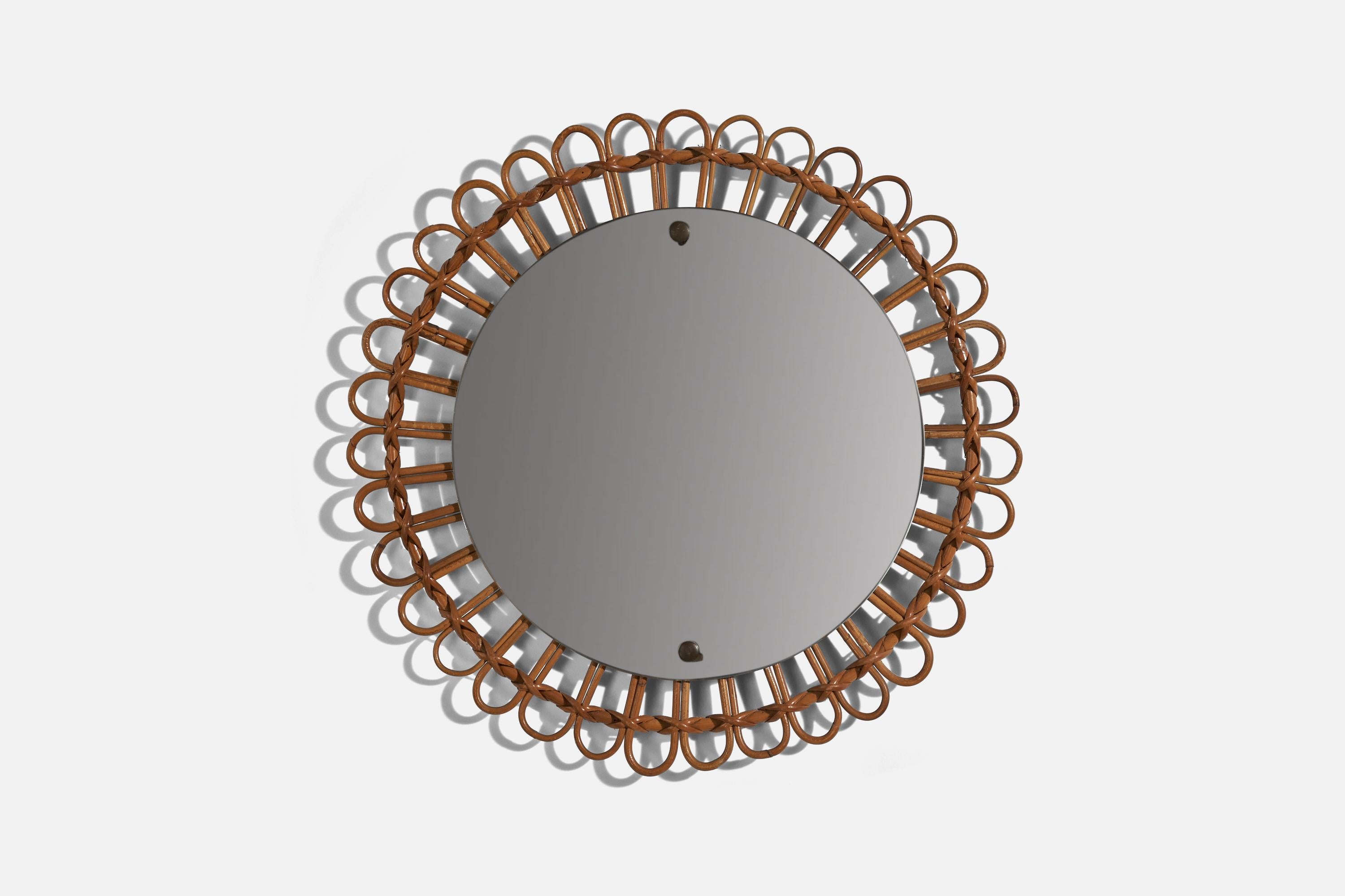 A bamboo and rattan wall mirror designed and produced in Italy, 1950s.