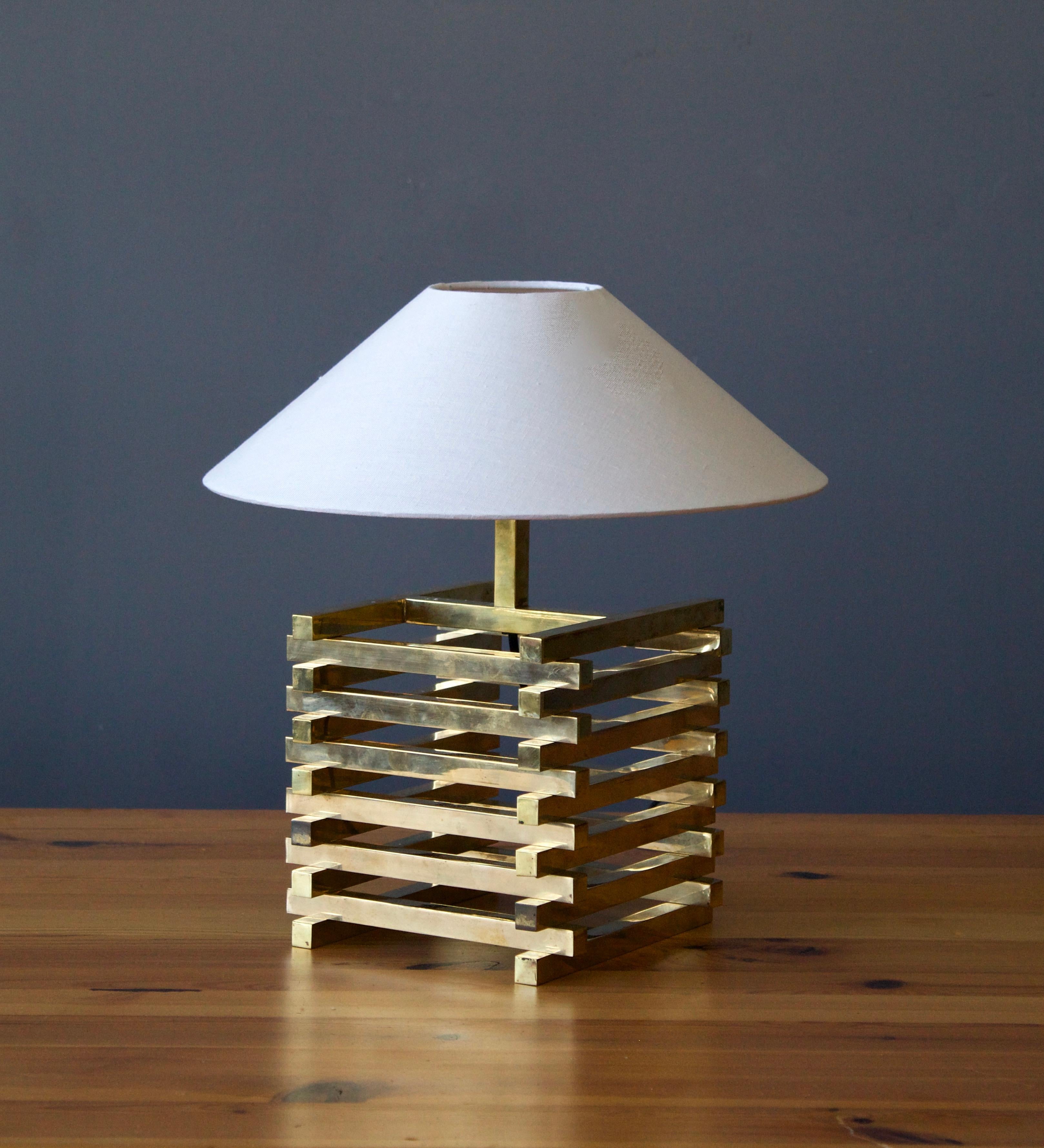 A table lamp, designed and produced in Italy, 1970s. In brass. 

Stated dimensions exclude lampshade, height includes socket. Sold without lampshades.

Other designers of the period include Gabriella Crespi, Donald Judd, Max Ingrand, Fontana