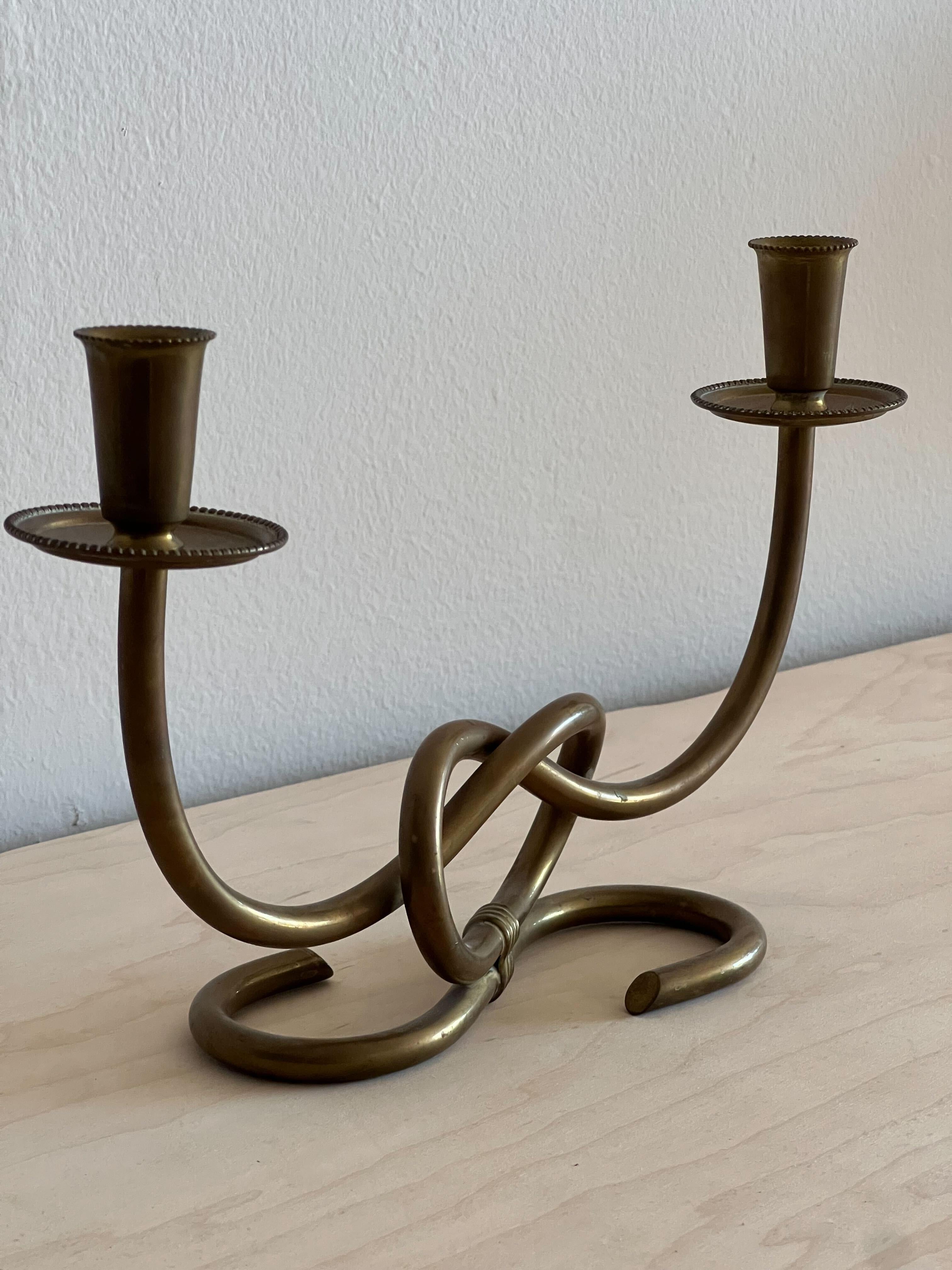 An organic brass candle holder or candelabra, designed and produced in Italy, 1940s.