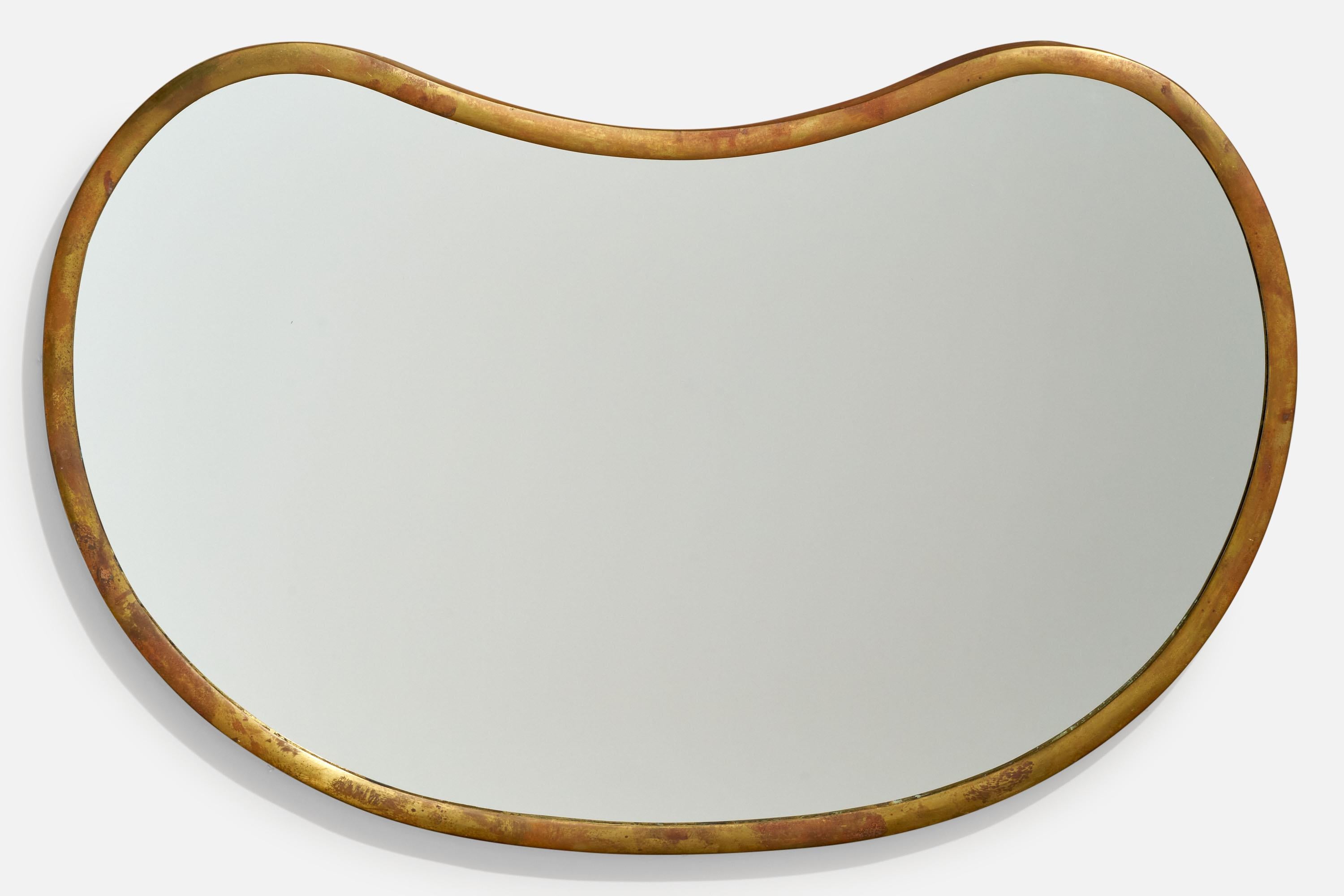 A brass wall mirror designed and produced in Italy, 1940s.