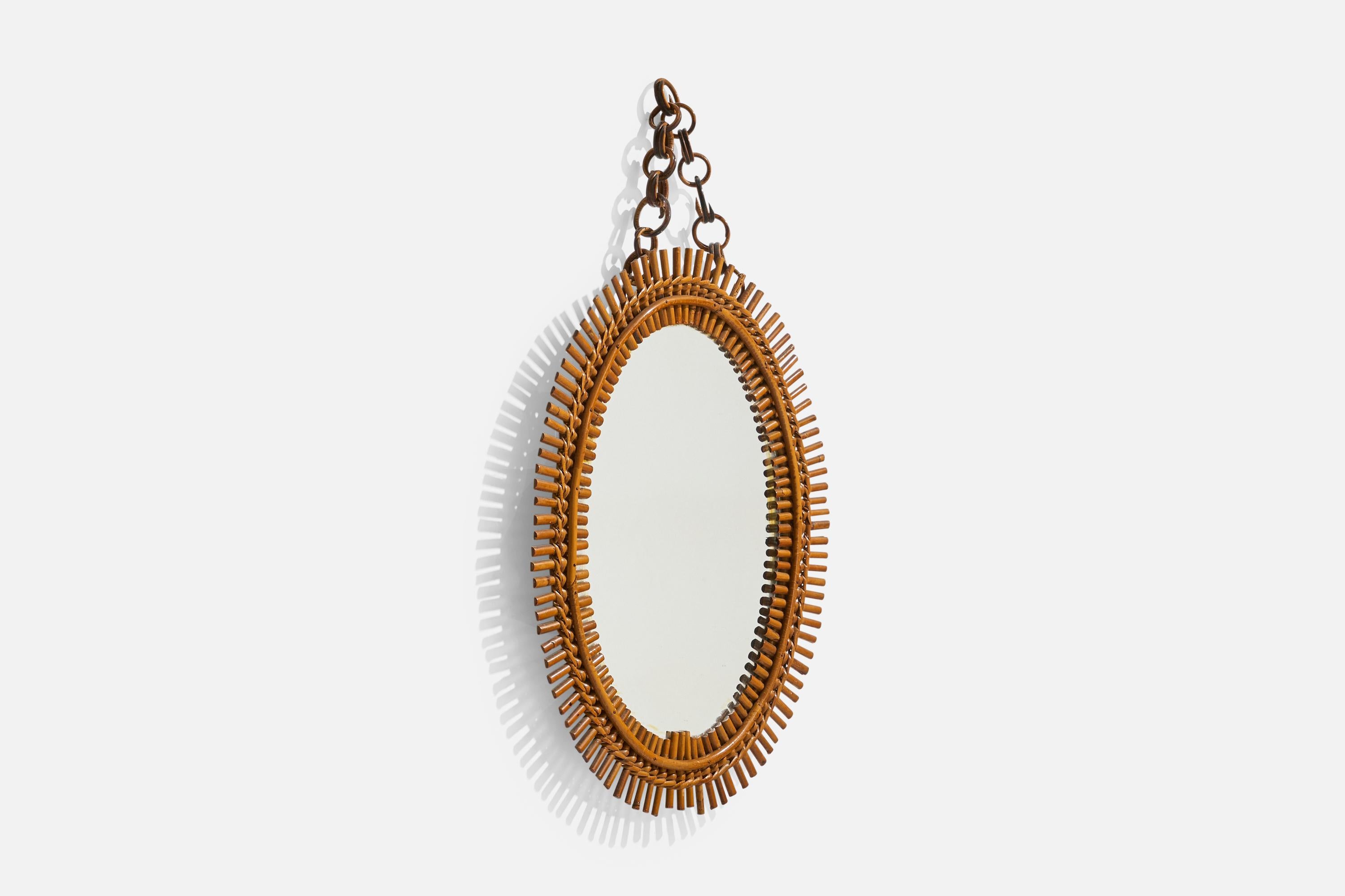 Diseñador italiano, Espejo de pared ovalado, ratán, cristal de espejo, Italia, S. 1950 Moderno de mediados de siglo en venta