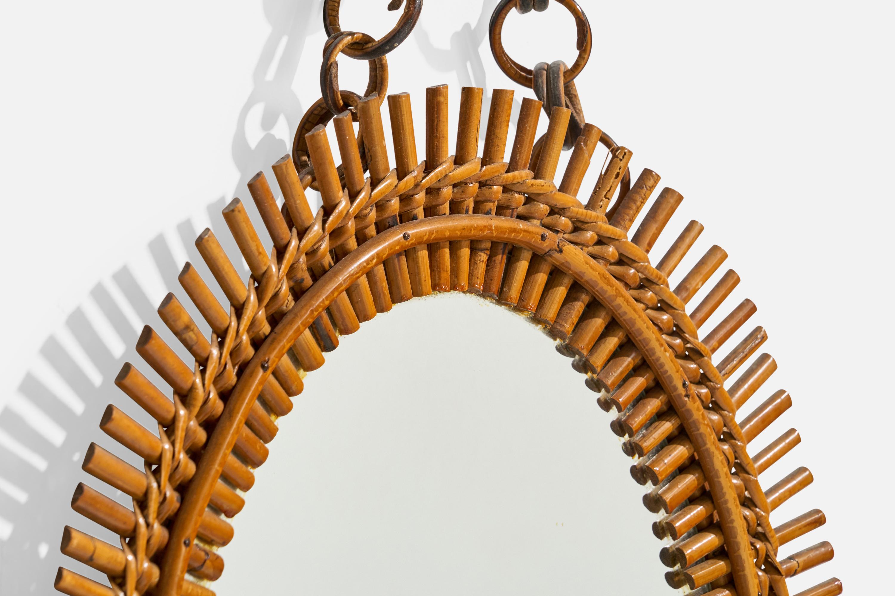 Diseñador italiano, Espejo de pared ovalado, ratán, cristal de espejo, Italia, S. 1950 en Bueno estado para la venta en High Point, NC