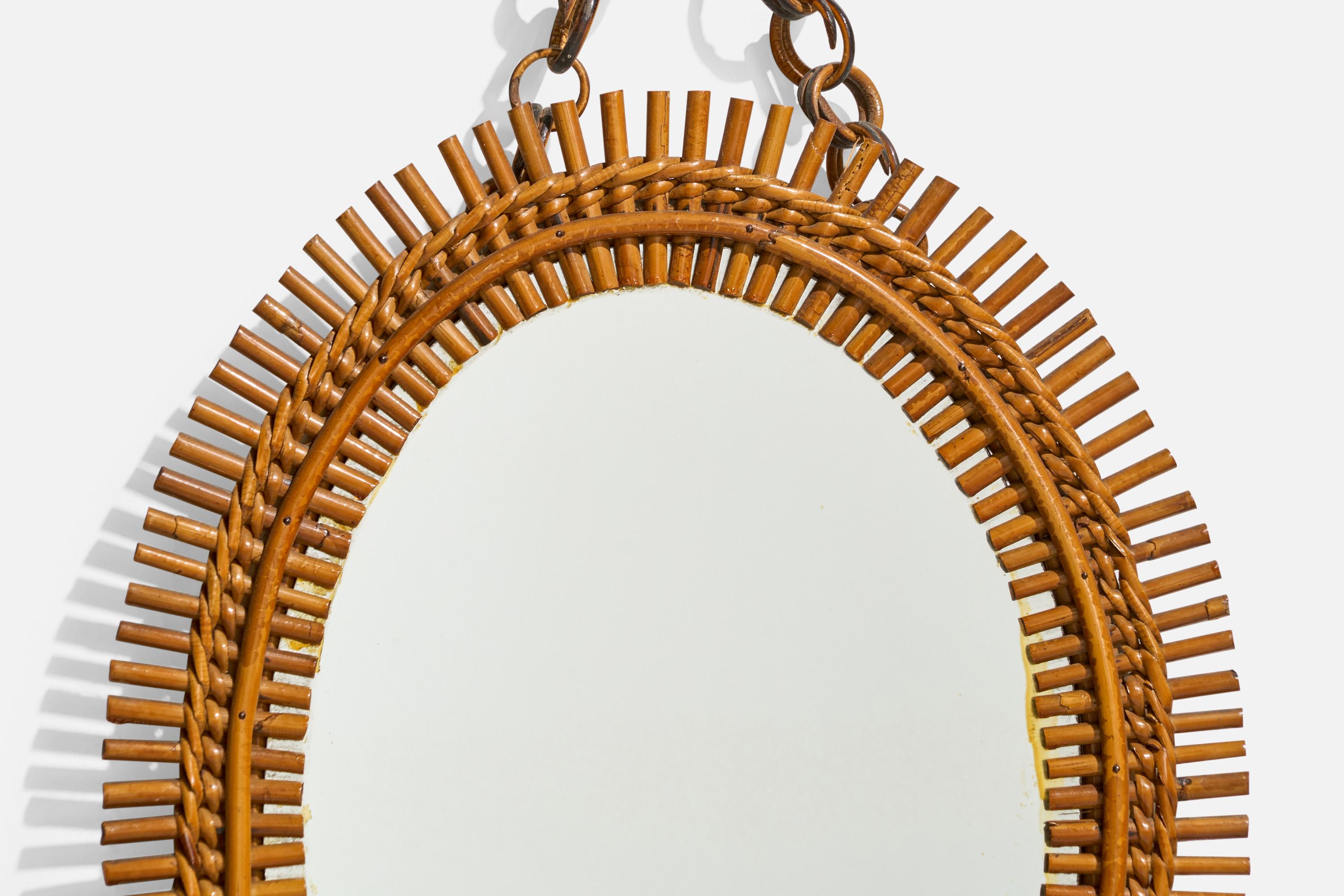 Diseñador italiano, Espejo de pared ovalado, ratán, cristal de espejo, Italia, S. 1950 mediados del siglo XX en venta