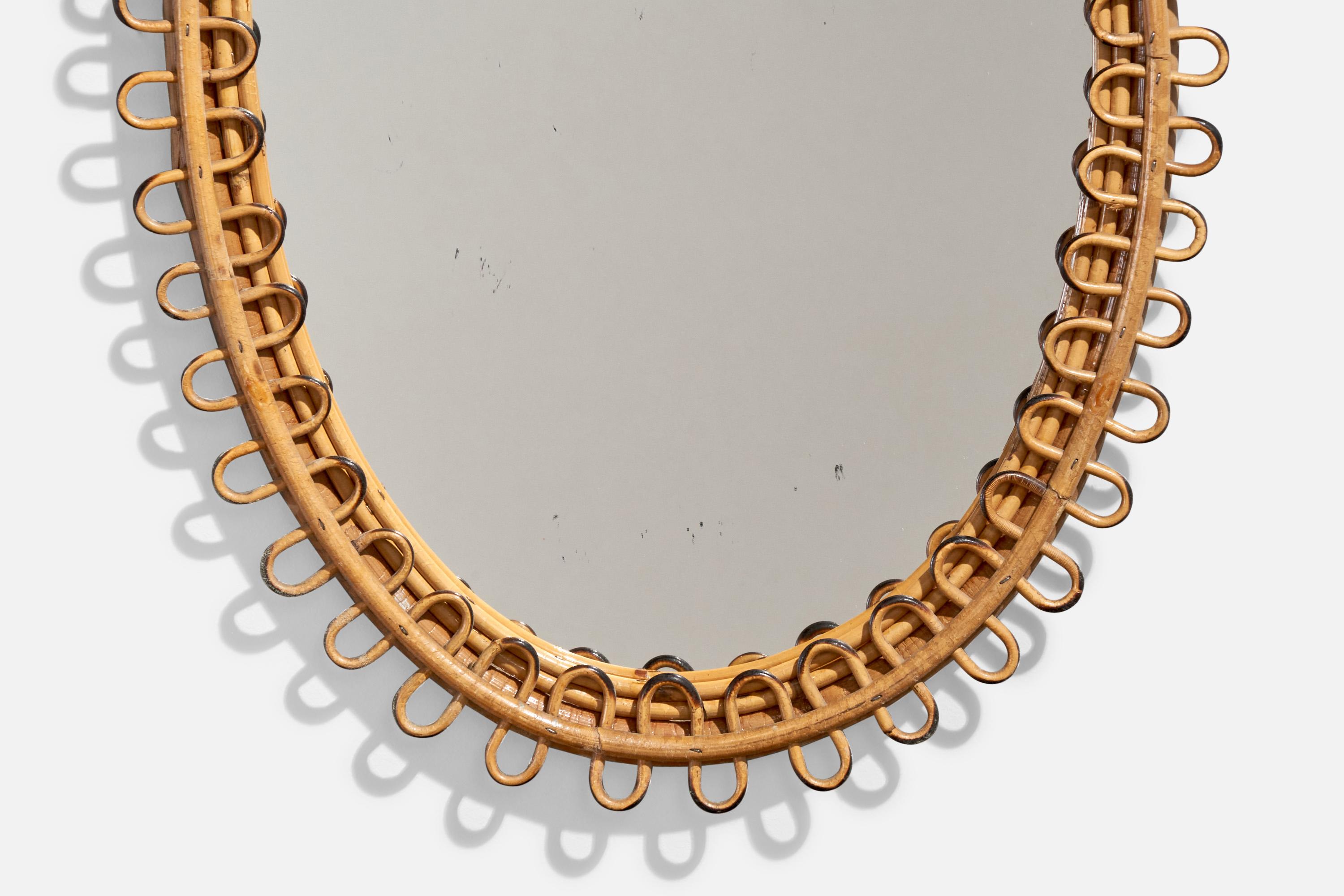 Designer italien, miroir mural ovale, rotin, verre de miroir, Italie, vers les années 1950 en vente 1
