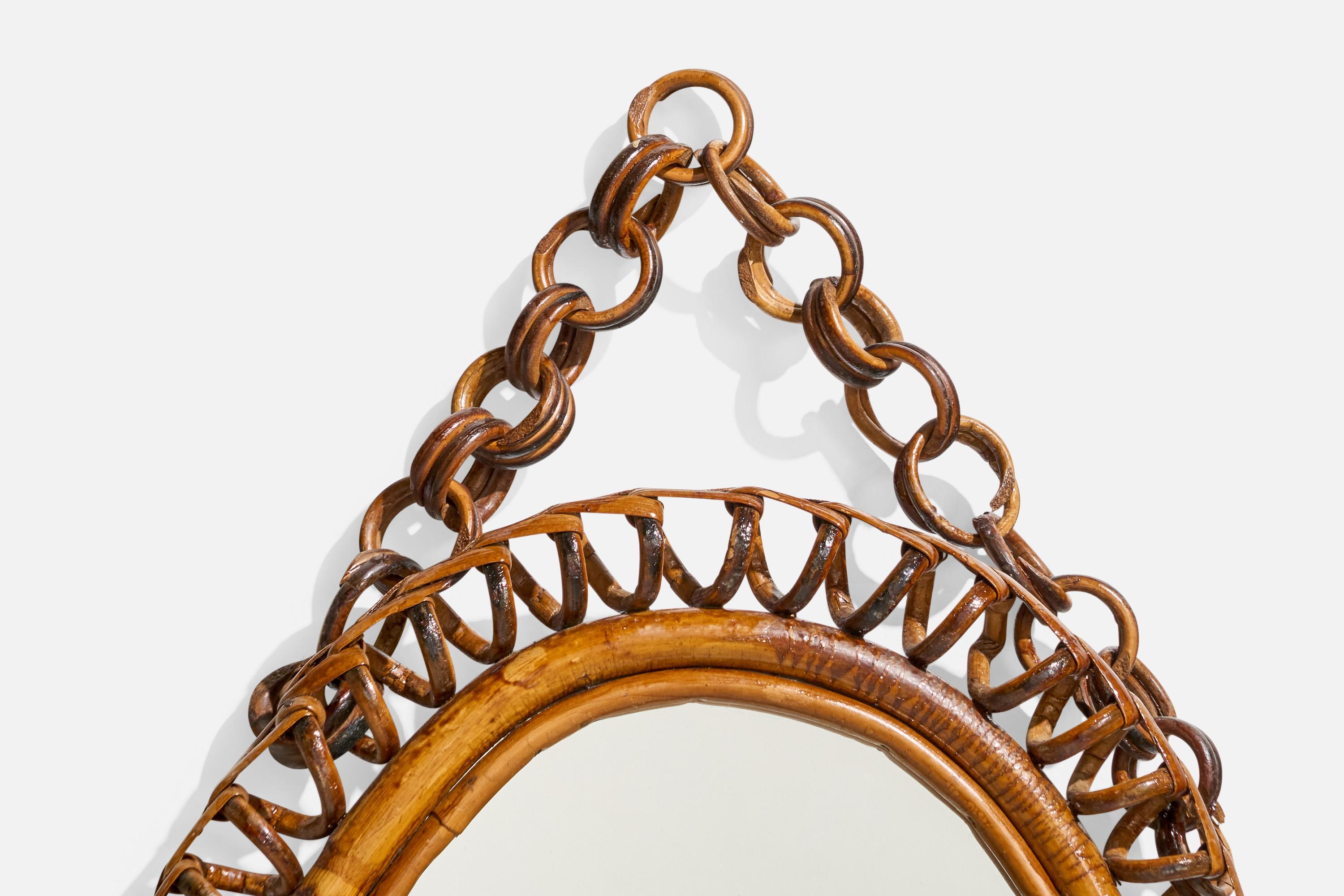 Italiano Specchio da parete ovale di design italiano, rattan, vetro a specchio, Italia, anni '50 circa in vendita