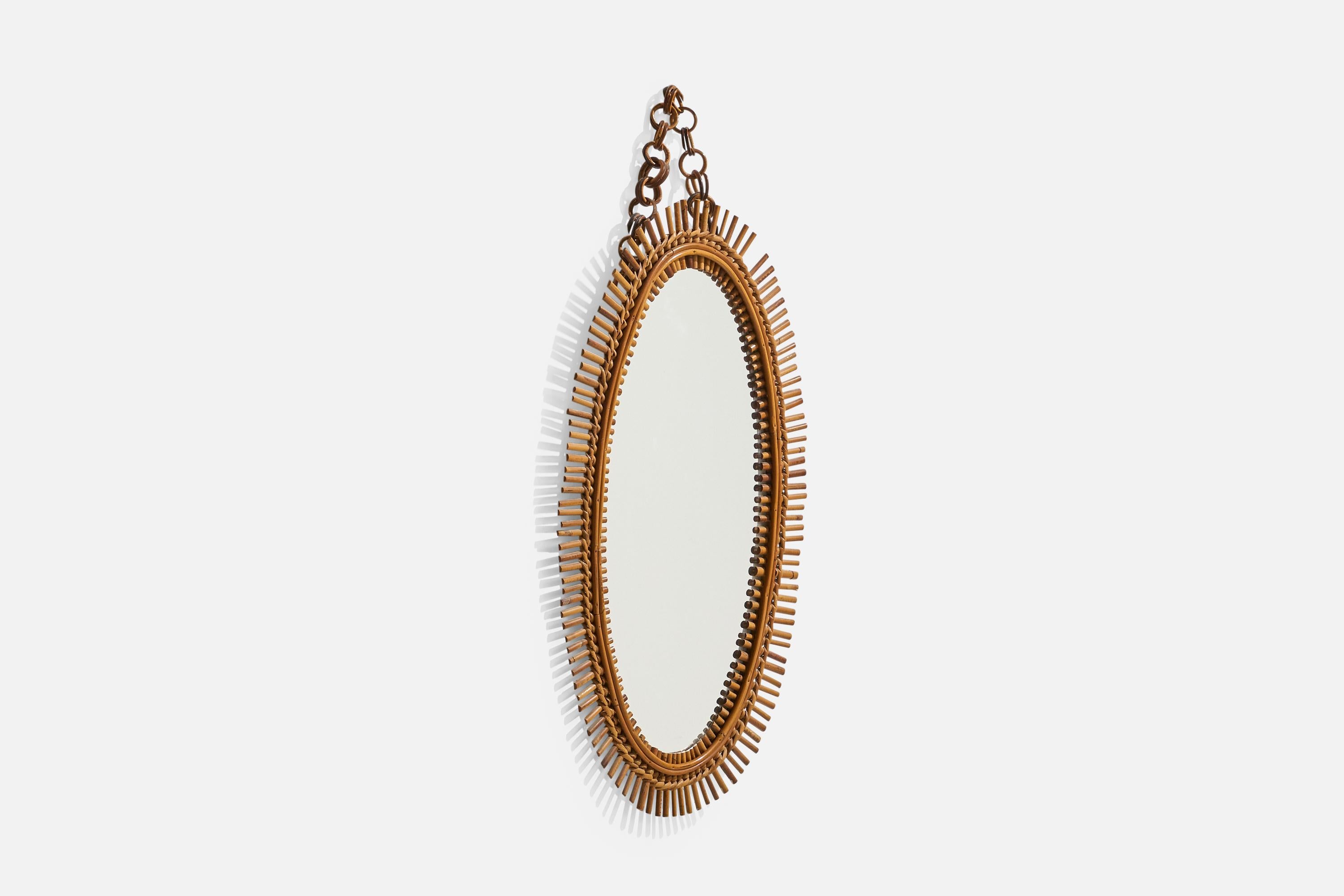 Mid-Century moderno Specchio da parete ovale di design italiano, rattan, vetro a specchio, Italia, 1950 ca. in vendita