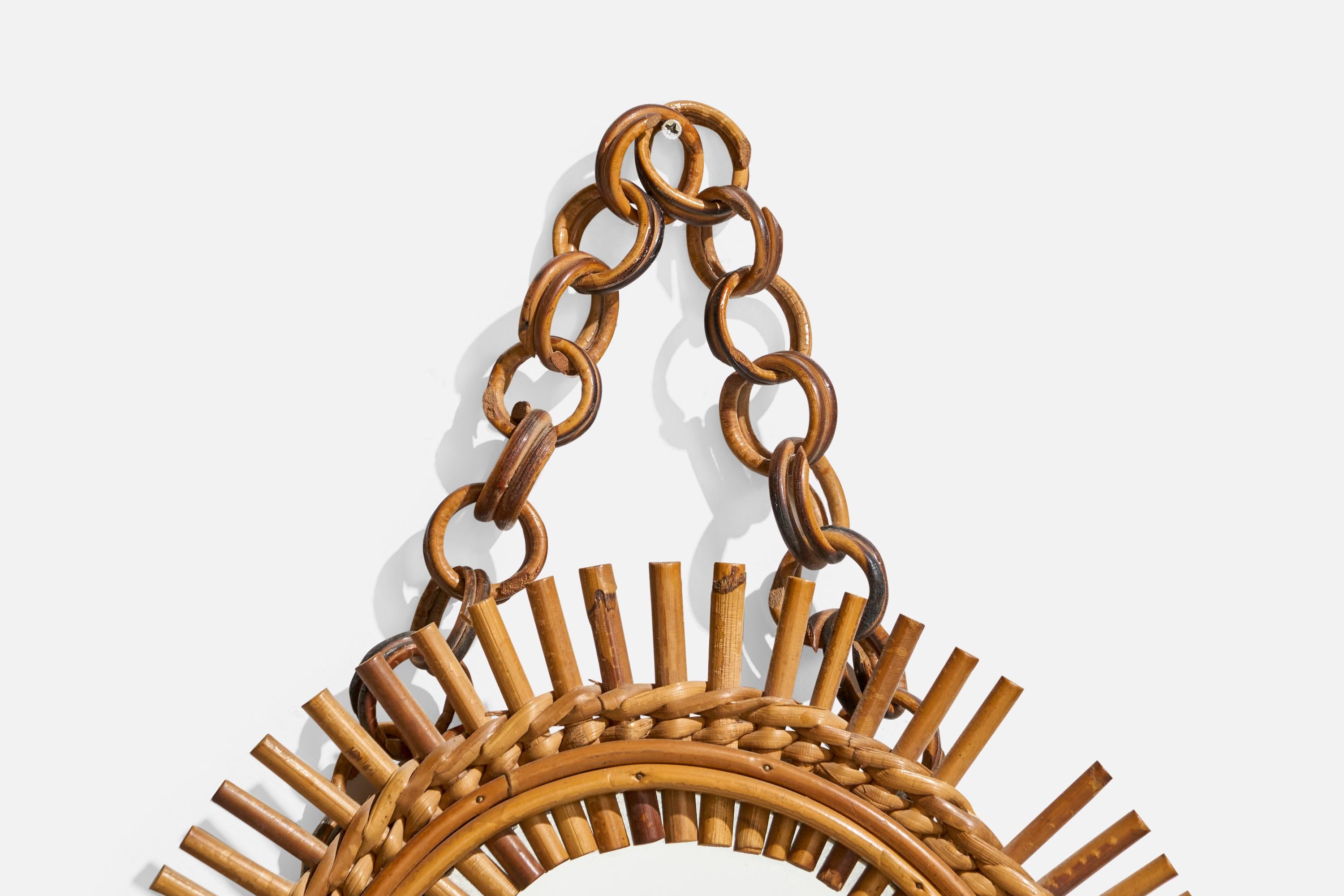 Italiano Specchio da parete ovale di design italiano, rattan, vetro a specchio, Italia, 1950 ca. in vendita