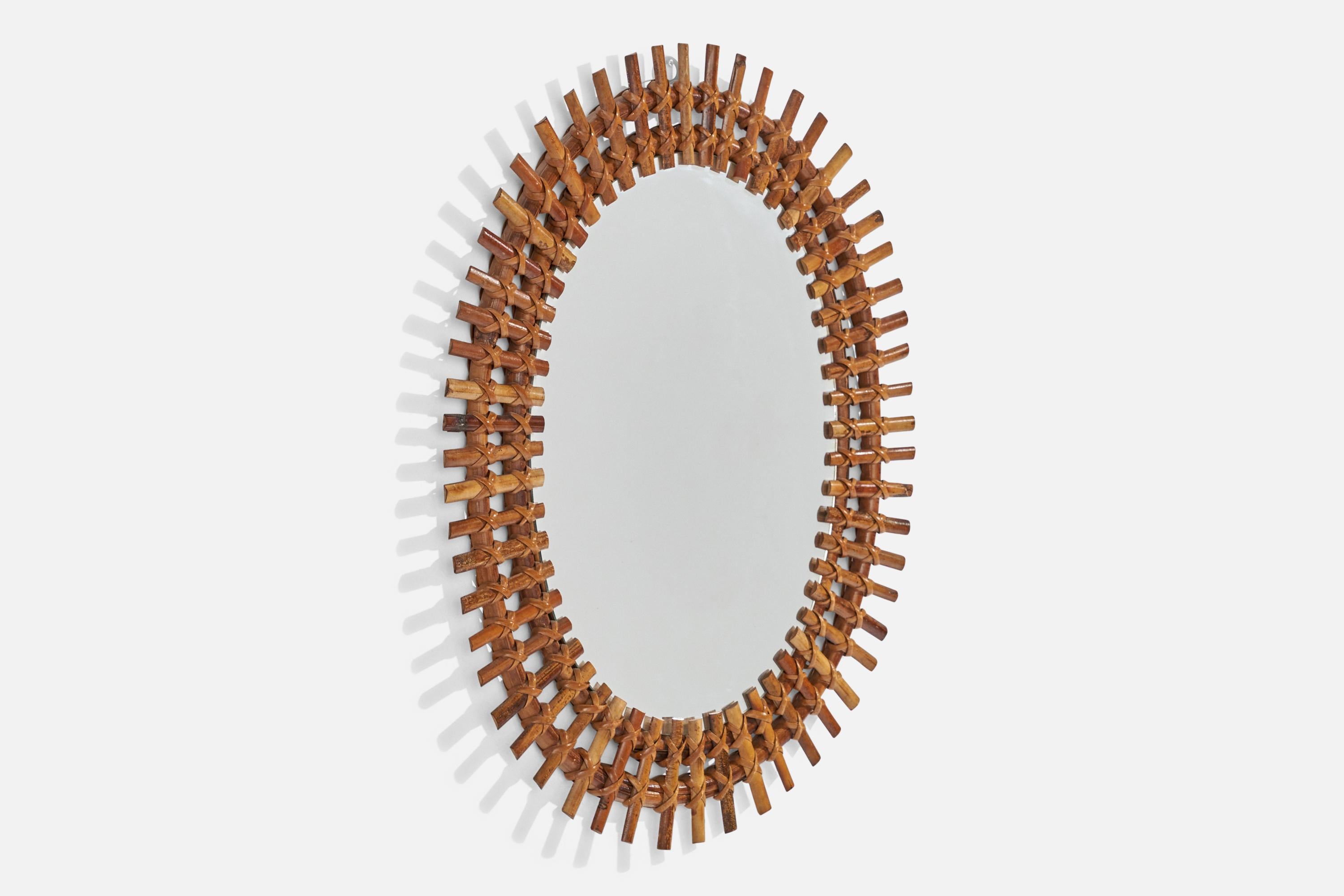 Mid-Century Modern Italian Designer, Oval Wall Mirror, Rattan, Mirror, Italy, C. 1950s For Sale