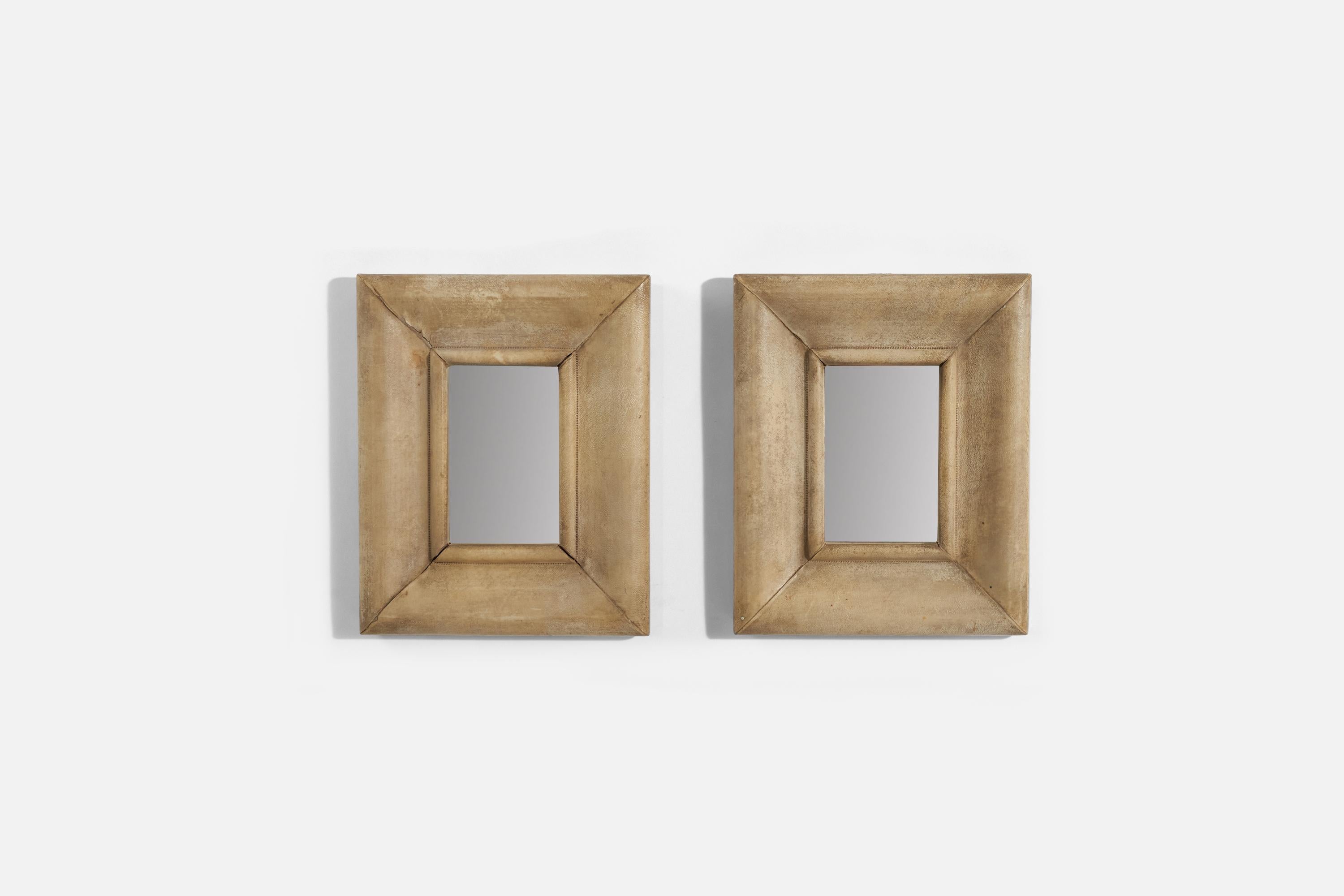 A pair of shagreen wall mirrors produced in Italy, 1940s. 
 