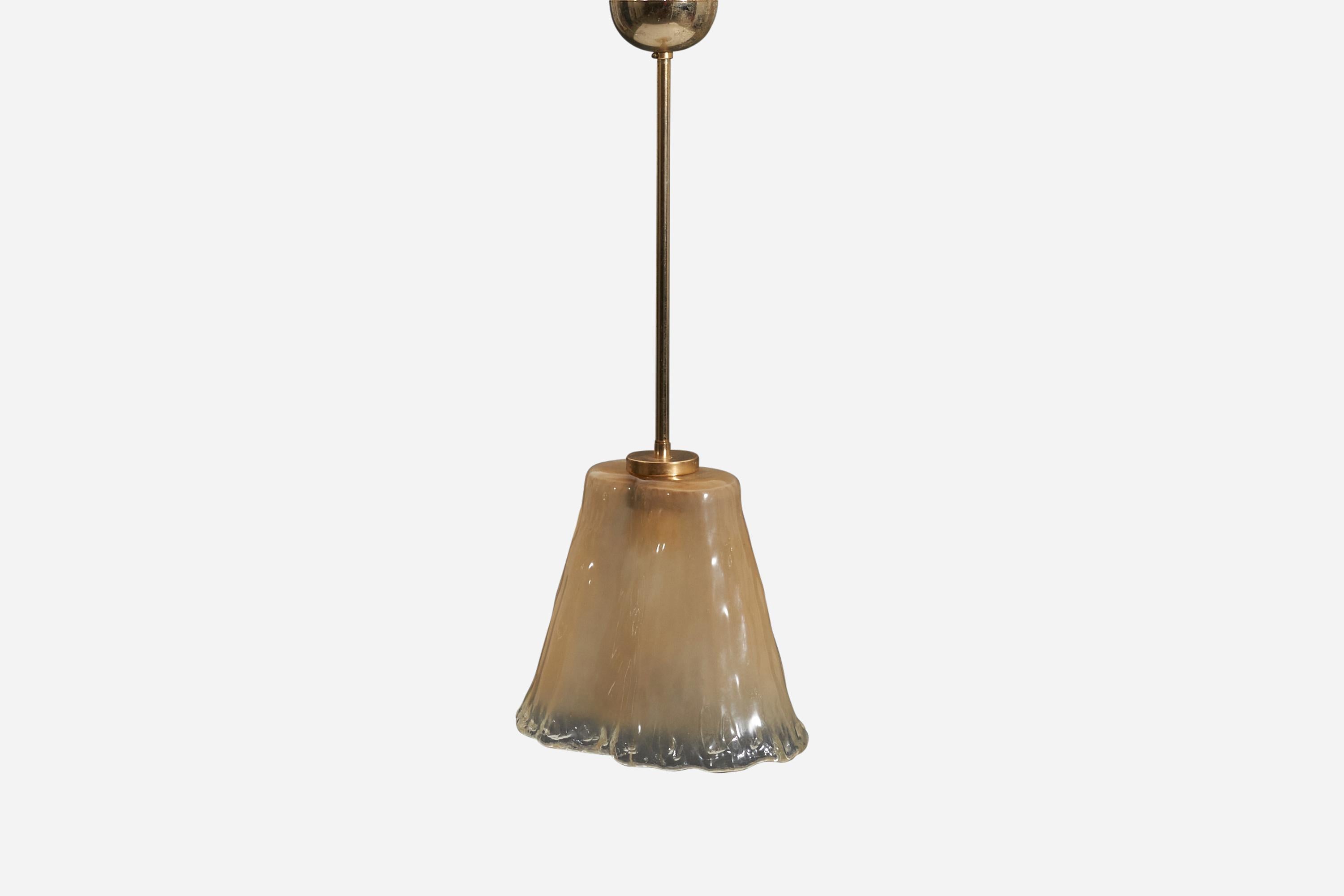 A brass pendant light with a Murano glass shade designed and produced in Italy, 1940s-1950s.
 