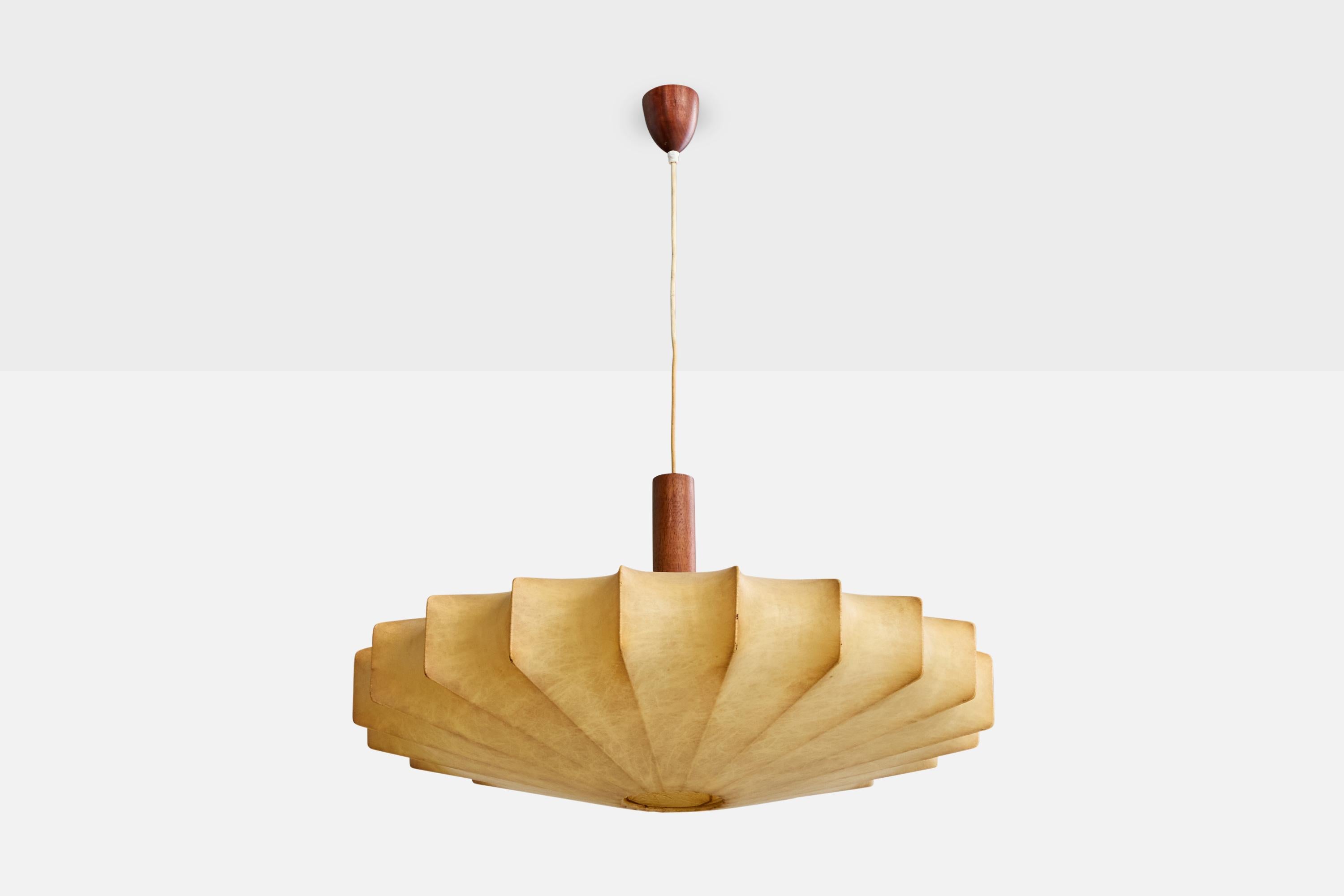 A sizable beige polymer-resin and teak pendant light designed and produced in Italy, c. 1960s.

Overall Dimensions (inches): 35.0