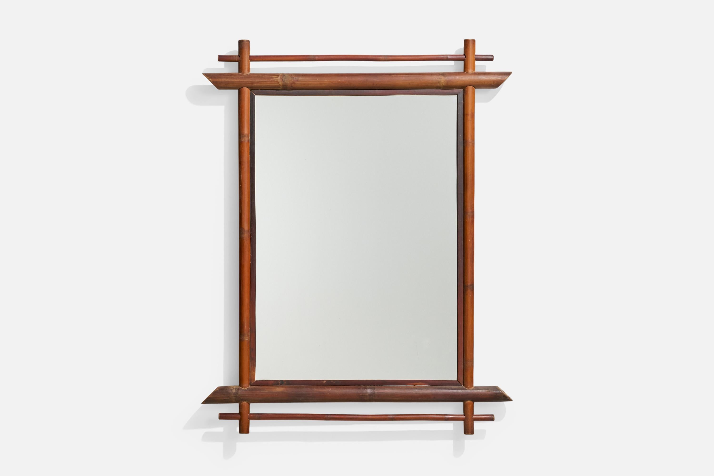 A rectangular, bamboo wall mirror designed and produced in Italy, 1960s.
  