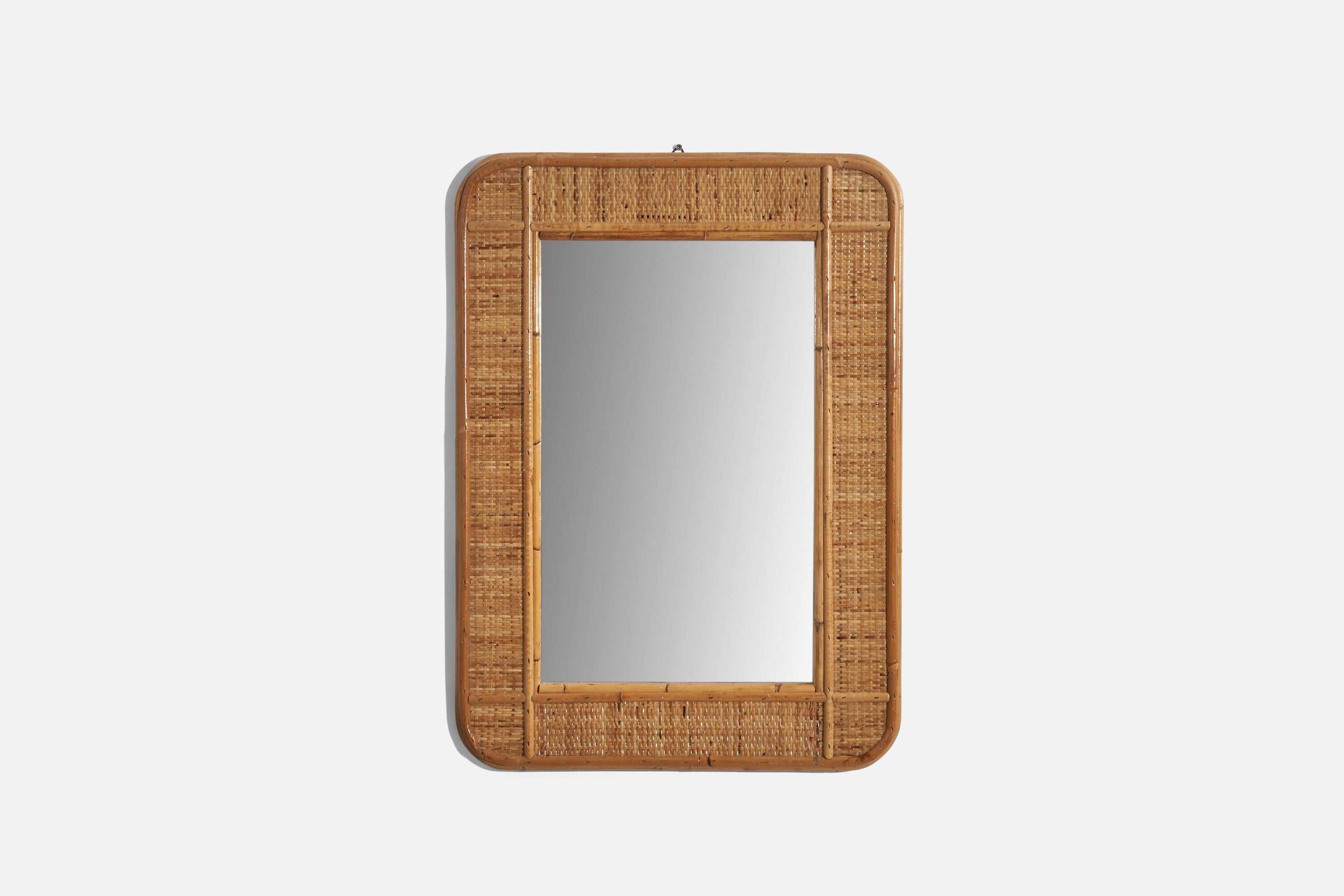 A rectangular, rattan wall mirror designed and produced by an Italian designer, Italy, 1950s-1960s.
 