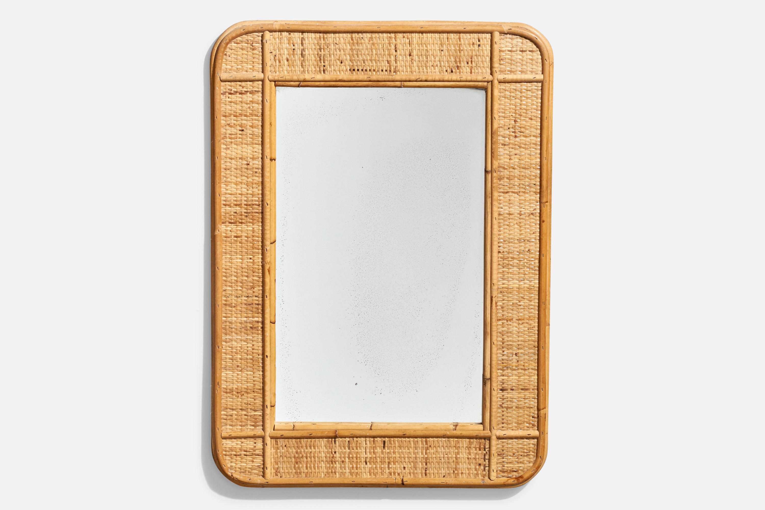 A rectangular, rattan wall mirror designed and produced by an Italian designer, Italy, 1950s-1960s.
 