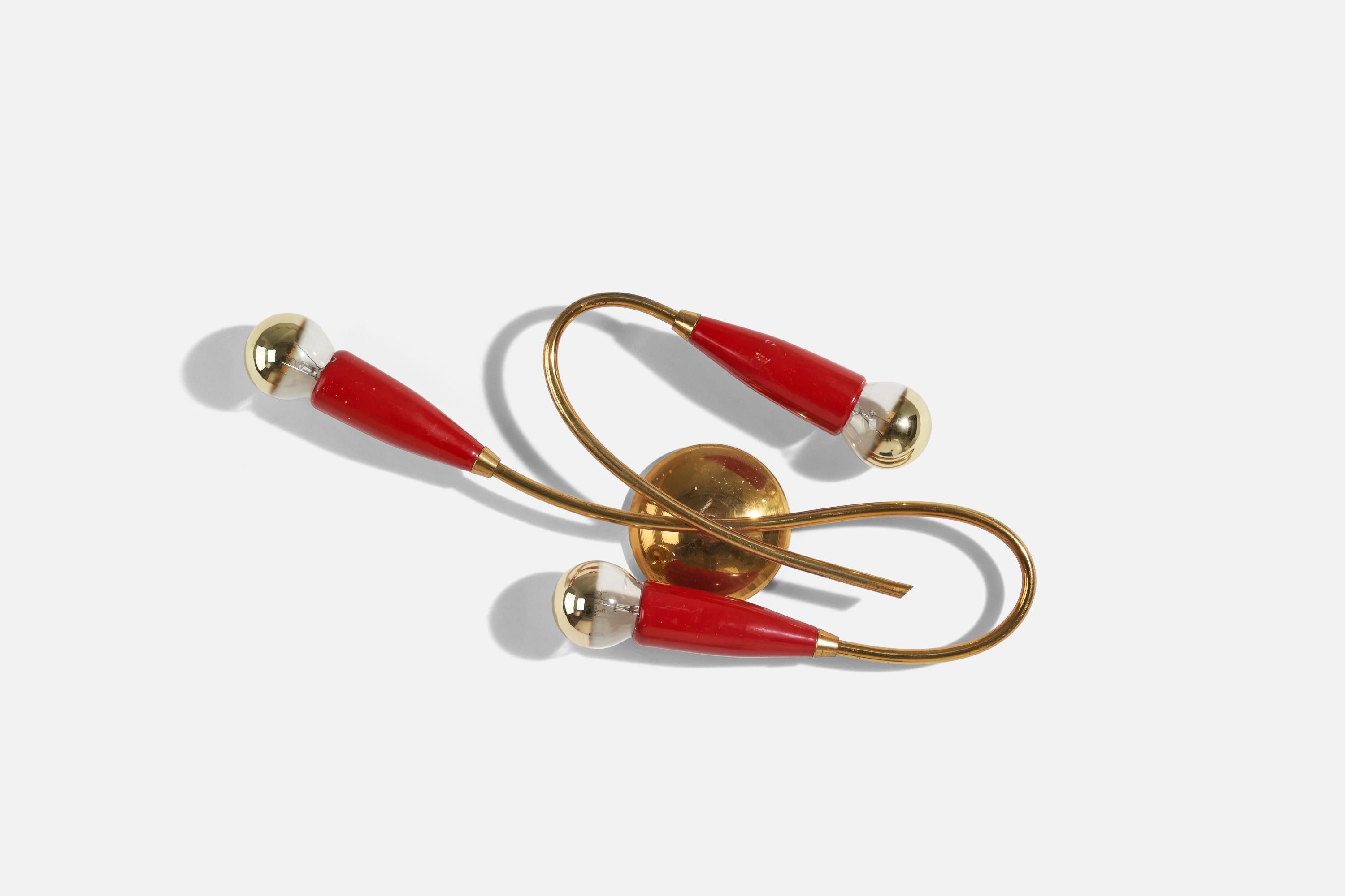 A brass and red-lacquered metal sconce/ wall light designed and produced by an Italian designer, Italy, 1950s.

Socket takes E-14 bulb.

There is no maximum wattage stated on the fixture.

Dimensions of Back Plate (inches) : 3.38 x 3.38 x 0.92