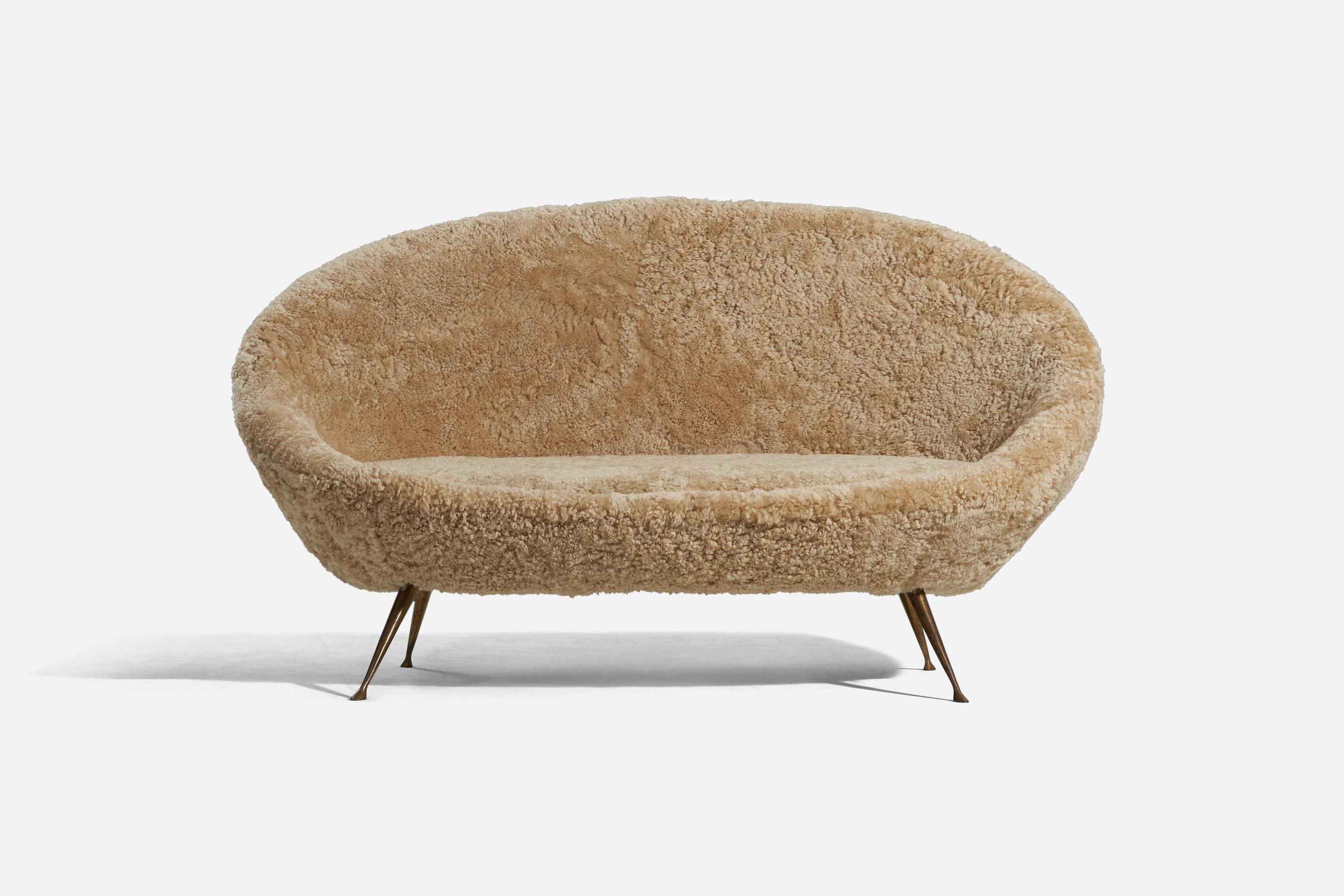 A shearling and brass settee designed and produced by an Italian designer, Italy, 1950s. 
