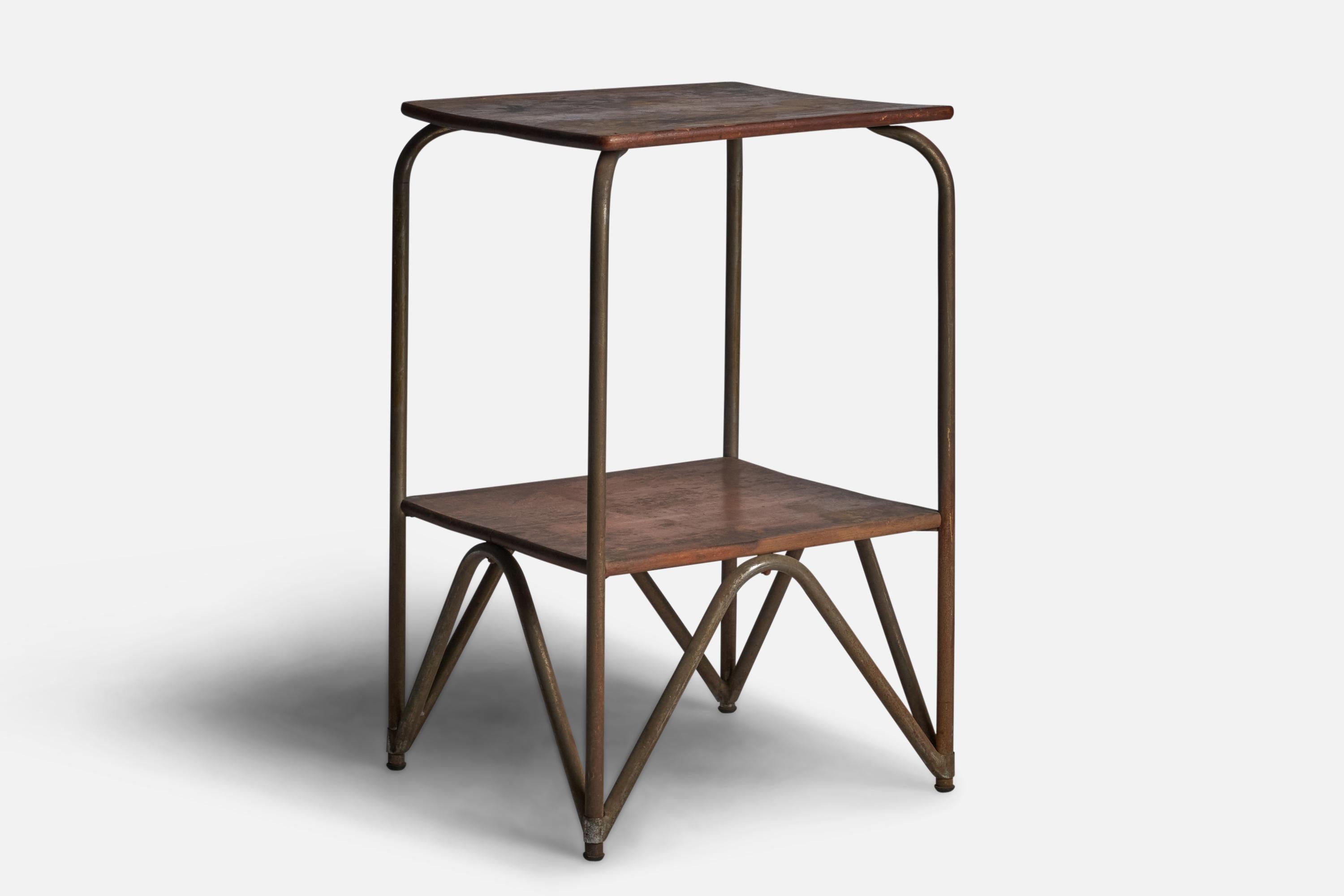 A two-tiered metal and wood side table designed and produced in Italy, 1930s.