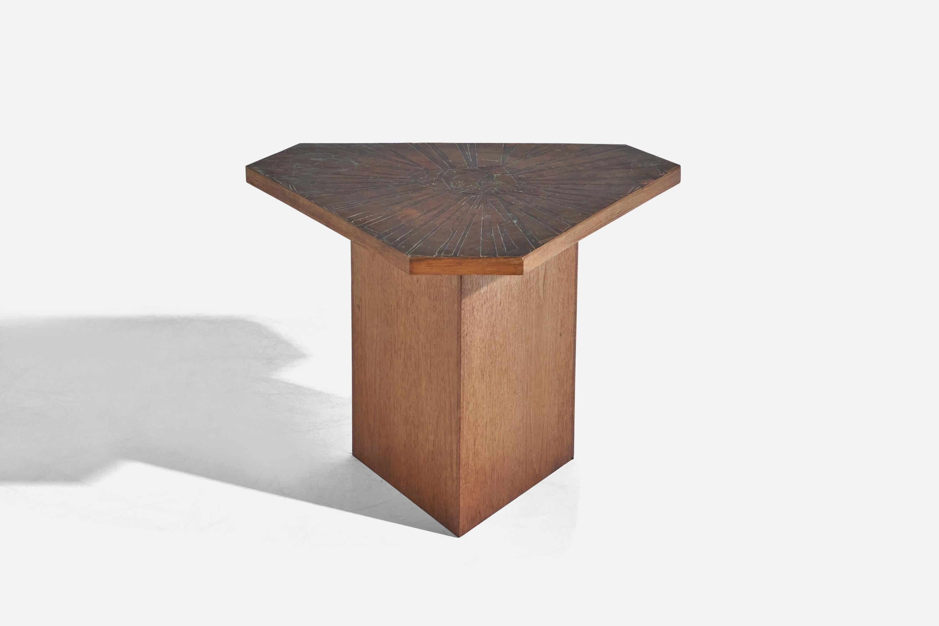 An oak and copper side table designed and produced by an Italian Designer, Italy, c. 1960s. Top is signed by artist.