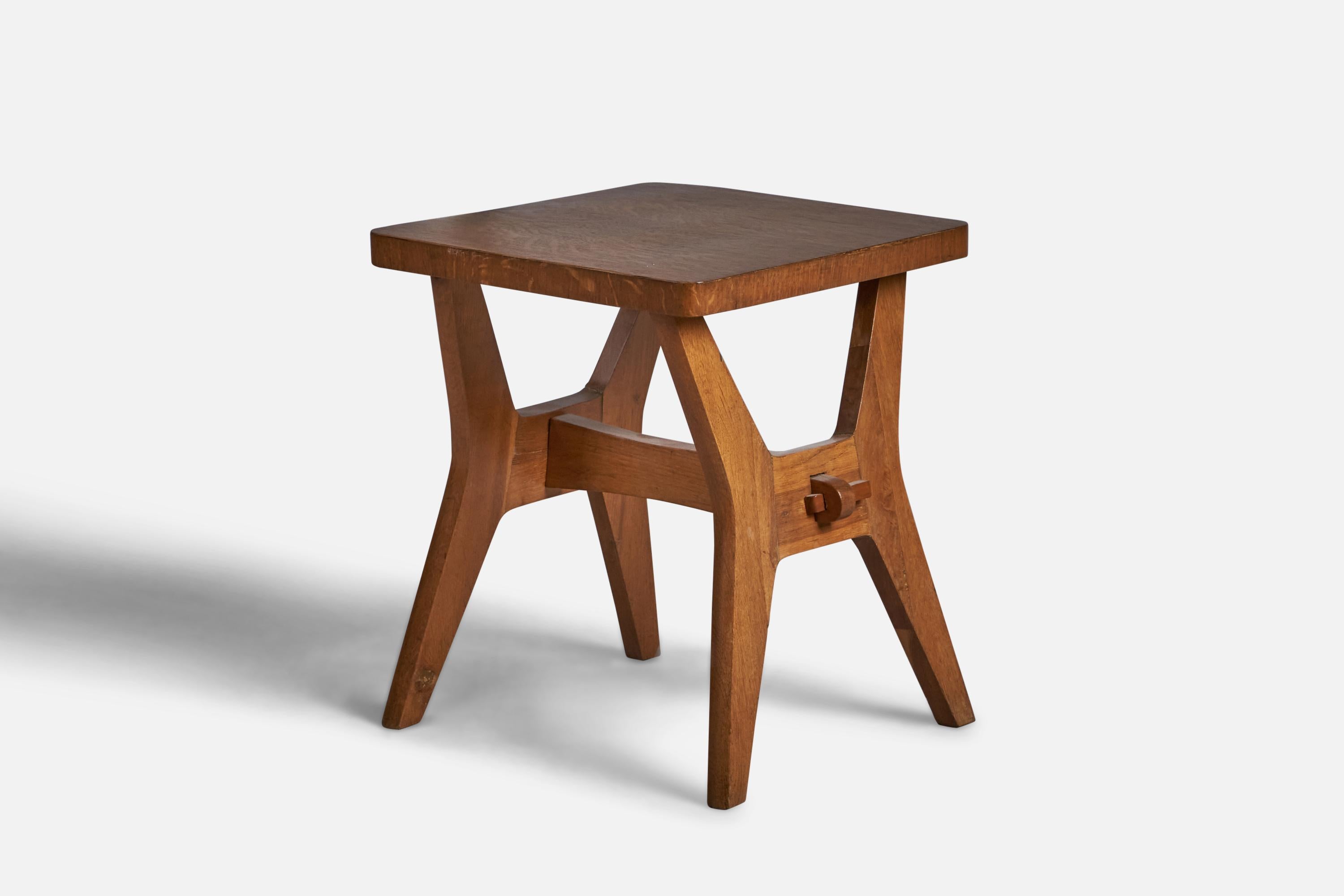 An oak side table or stool designed and produced in Italy, 1940s.