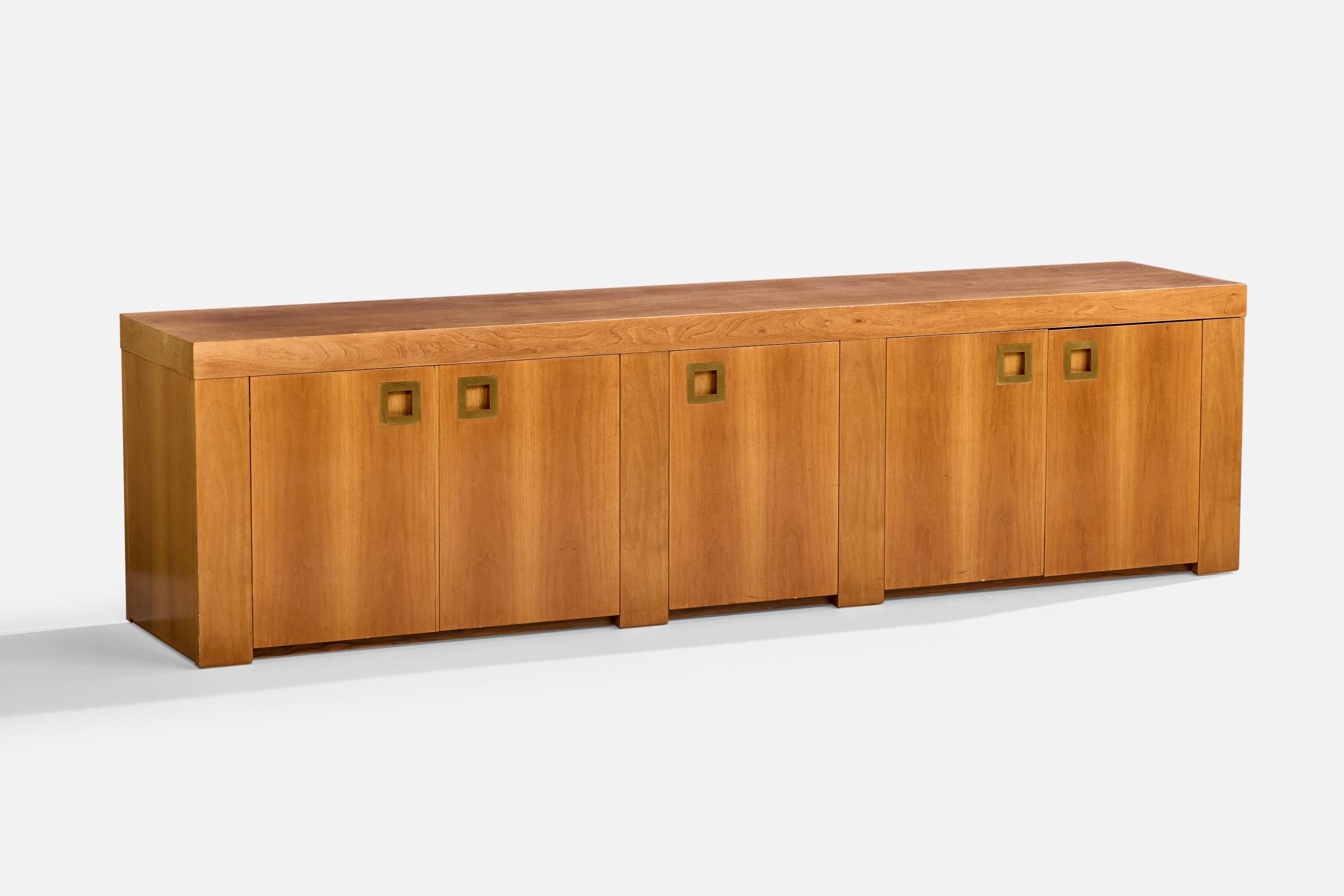 A sizable teak and brass sideboard or cabinet designed and produced in Italy, c. 1970s.

Overall Dimensions (inches): 28.0
