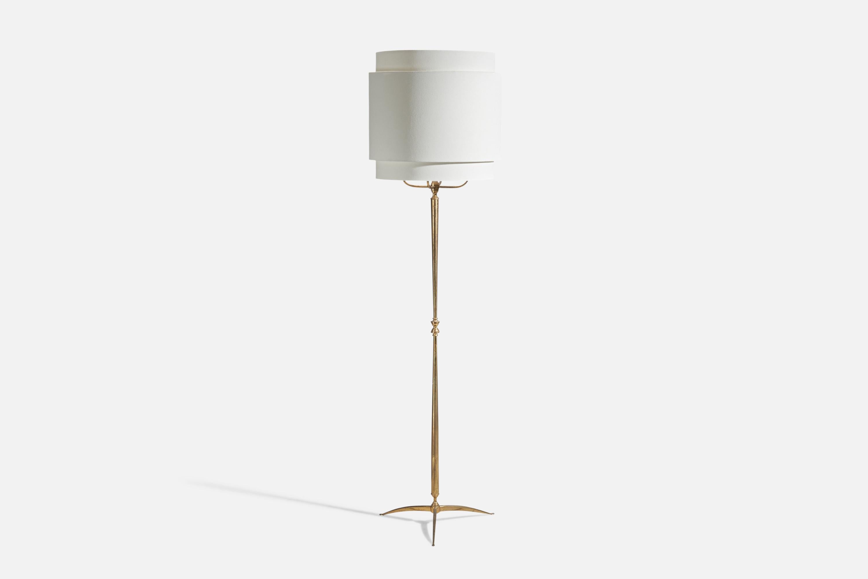 A brass and fabric floor lamp designed and produced in Italy, 1950s.

Sold with Lampshade. Dimensions stated are of Floor Lamp with Lampshade. 

4 light sources, E-14 sockets.

There is no maximum wattage stated on the fixture.