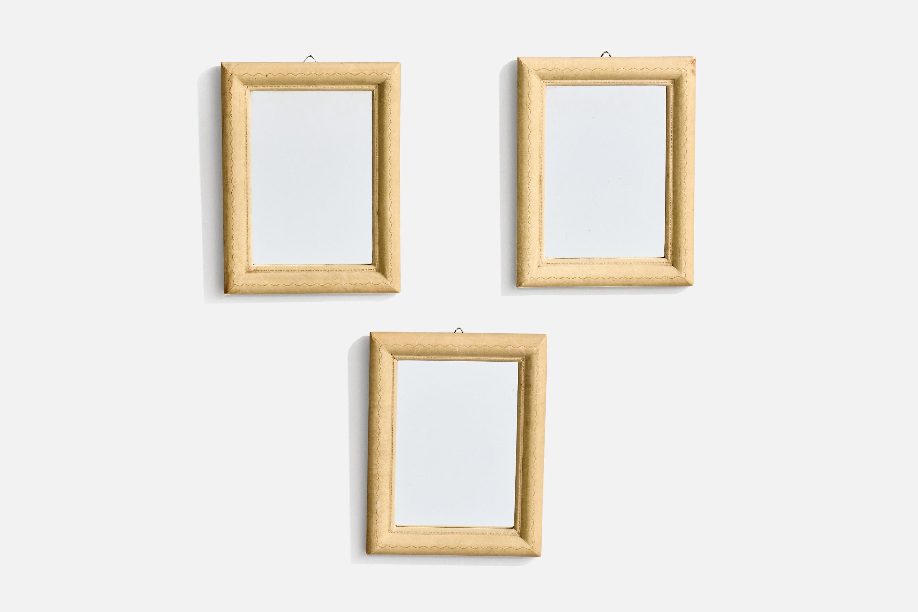 A set of 3 small shagreen wall mirrors designed and produced by an Italian designer, Italy, 1930s.
 