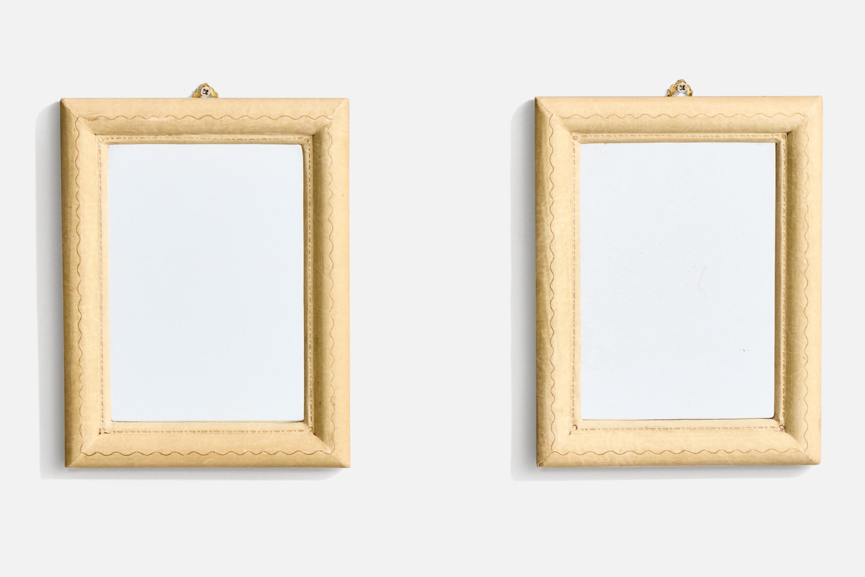 A pair of small shagreen wall mirrors designed and produced by an Italian designer, Italy, 1930s.
 