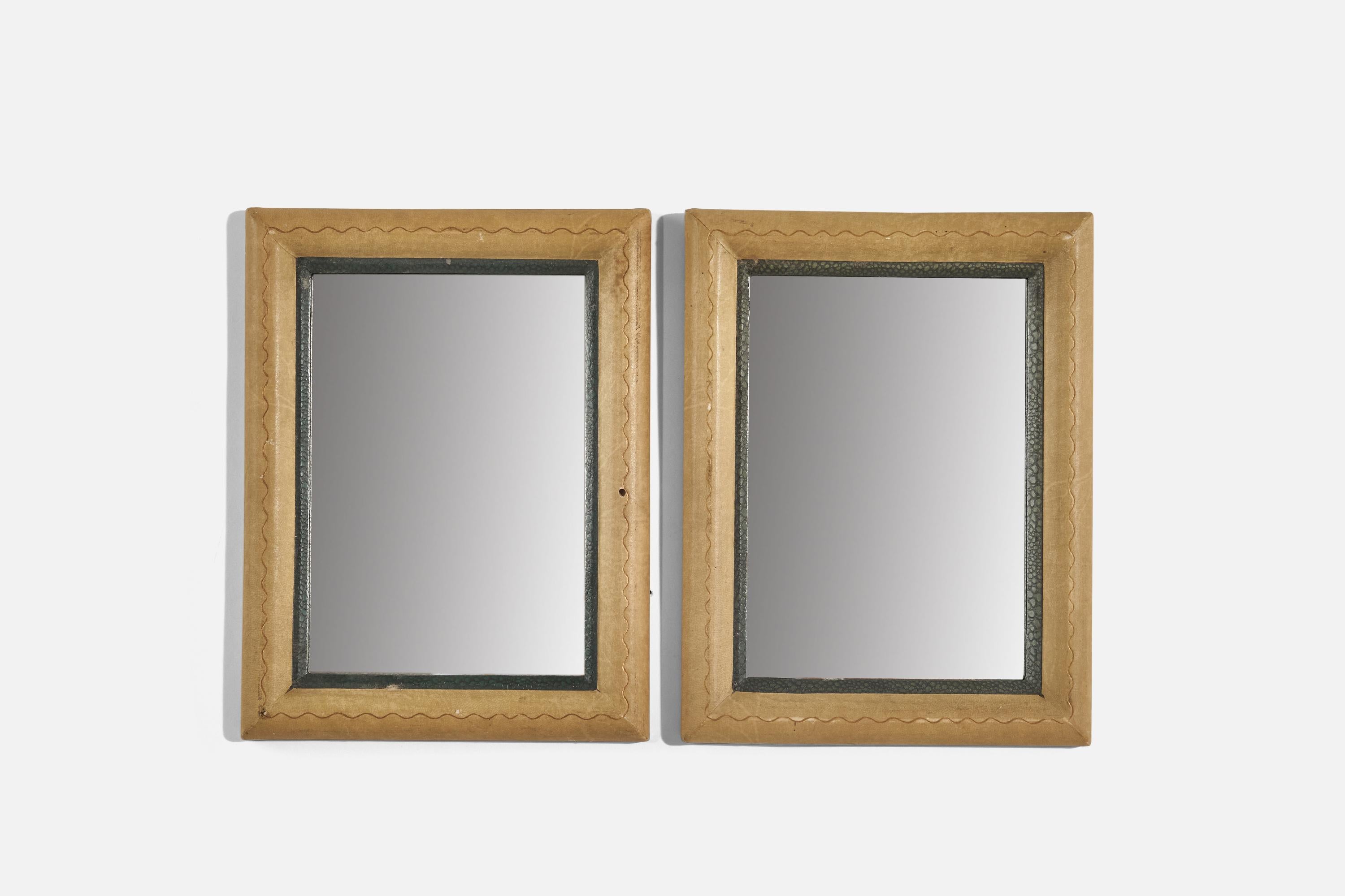 A pair of small shagreen wall mirrors designed and produced by an Italian designer, Italy, 1930s.
 