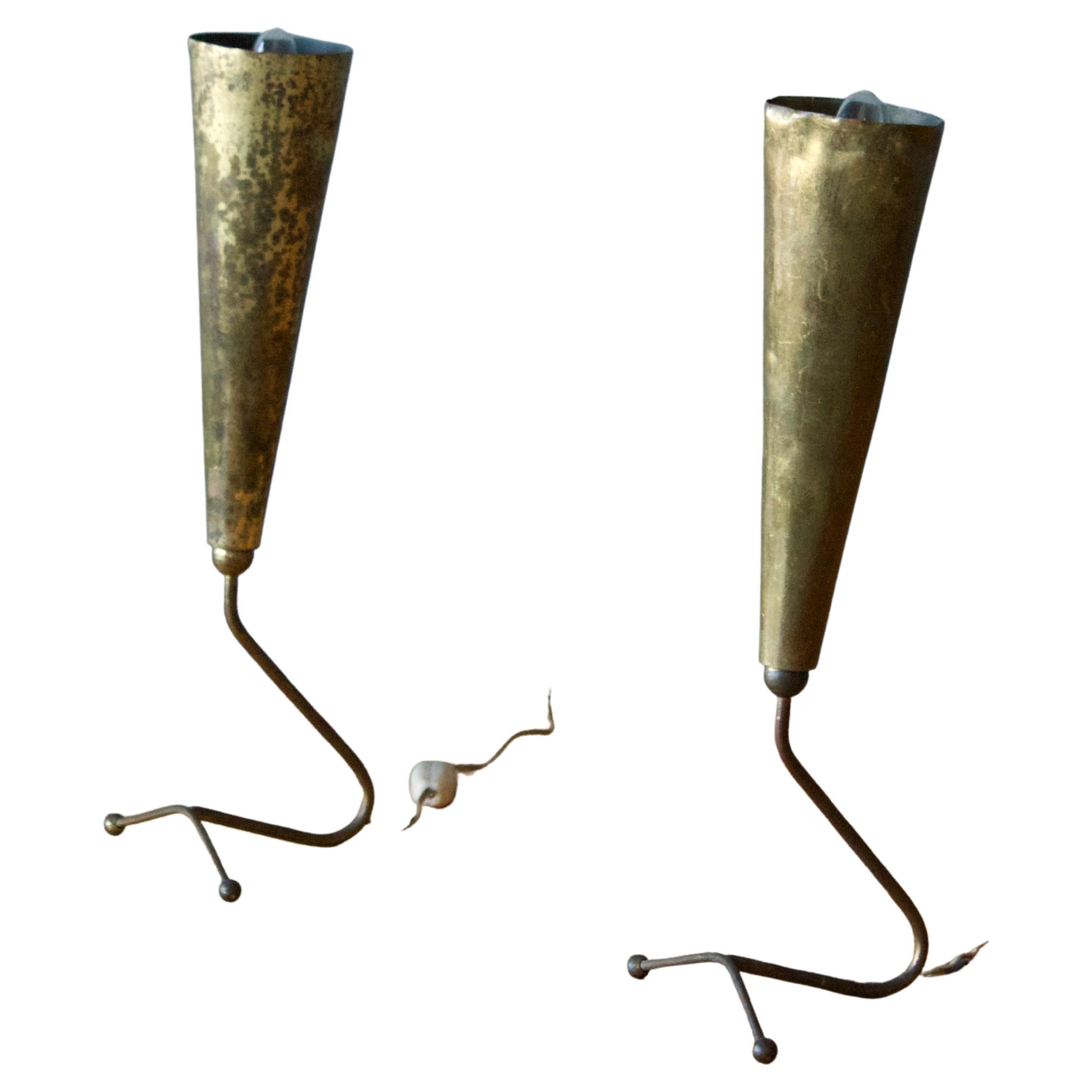 A pair of small table lamps, designed and produced in Italy, 1940s. In brass. 

Other designers of the period include Gabriella Crespi, Donald Judd, Max Ingrand, Fontana Arte, and Gino Sarfatti.